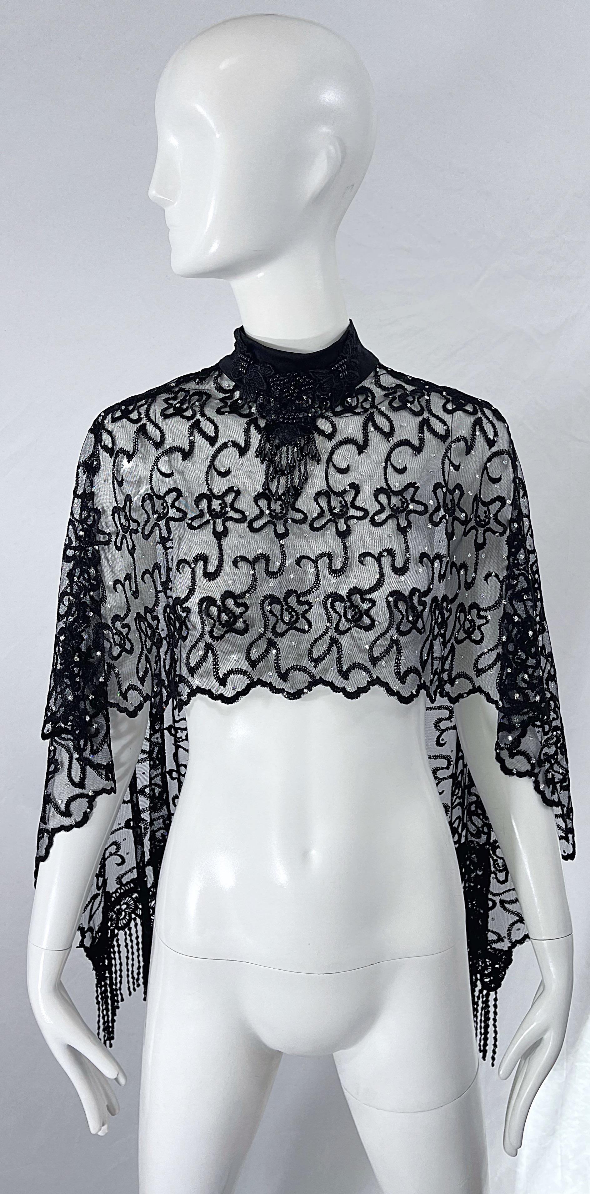 Collectible mid 70s HALSTON black sheer mesh beaded and sequin dot fringe large disco poncho cape shawl ! I can only imagine this rare beauty on the dance floor at Studio 54. Sheer black silk mesh with intricate embroidery throughout. Silver dots of