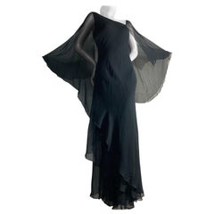 1970s Halston Black Silk Chiffon Tiered Bias One-Shoulder Gown w Sheer Cape