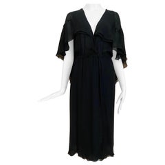 HALSTON - Robe portefeuille en mousseline de soie noire des années 1970