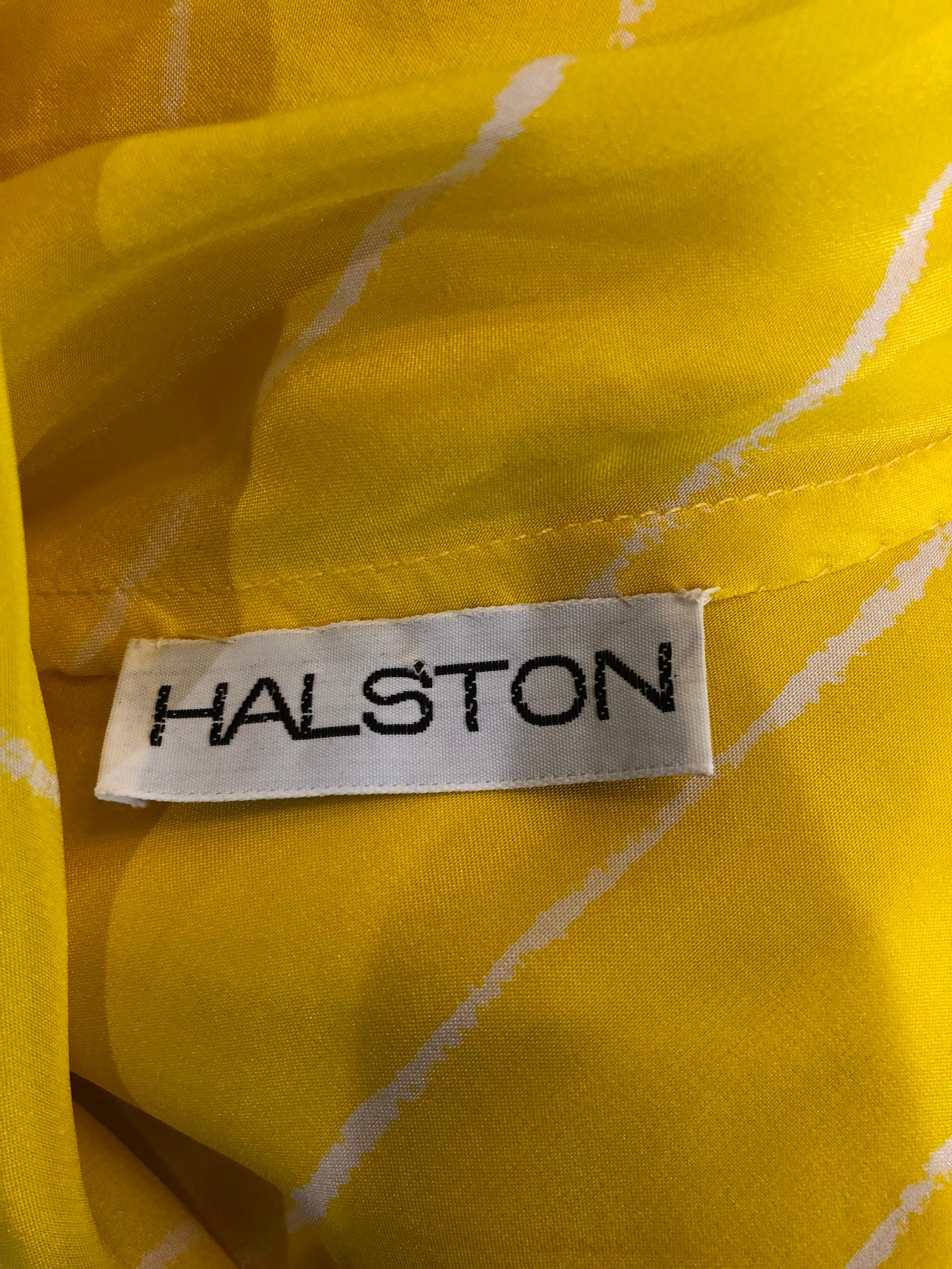 Amazing vintage 1970s HALSTON canary yellow and white chevon striped silk scarf dress! Features a beautiful yellow color with flattering thin white chevron stripes throughout. Attached long silk scarf can be worn a number of ways. Elastic waistband
