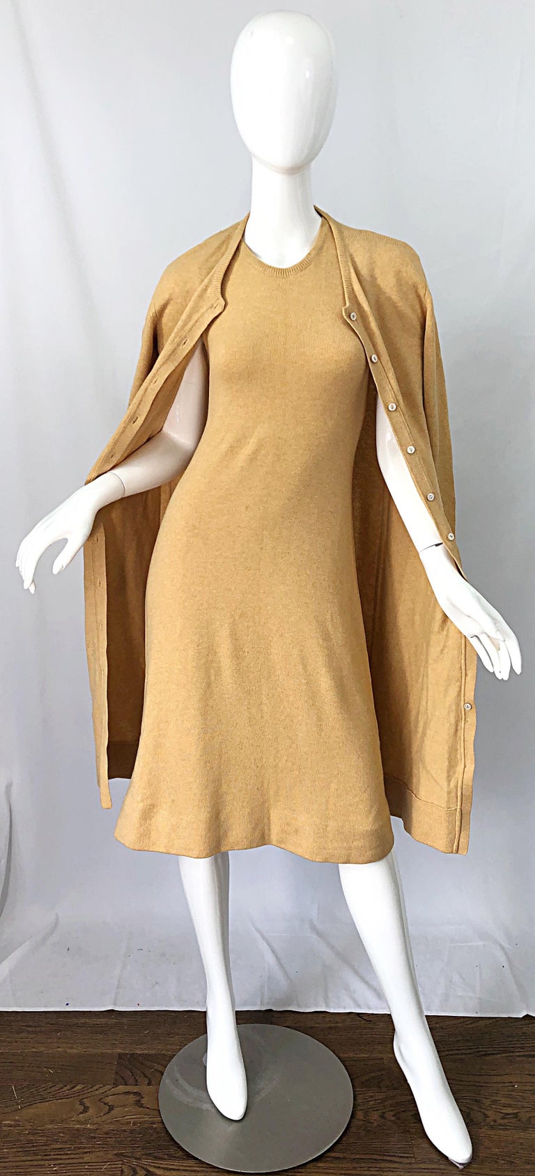 No one did cashmere or beading quite like HALSTON! This chic 1970s HALSTON ensemble consists of a long cashmere cardigan and sleeveless cashmere dress. Simply slips over the head and stretches to fit. Cardigan buttons up the front. Both pieces great