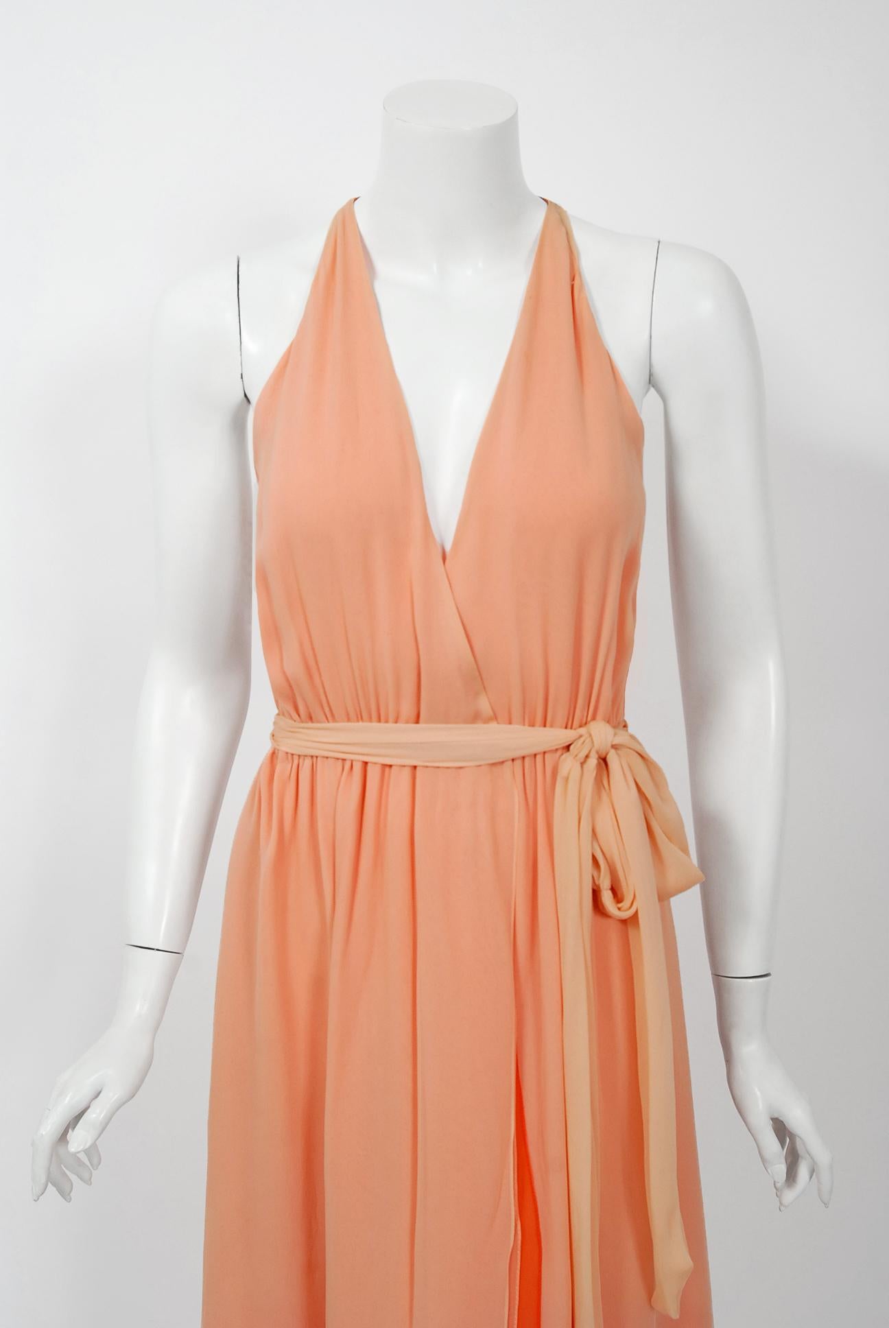 Gorgeous Halston Couture peach ombre wrap dress dating back to the mid 1970's. Halston revolutionized the way women dress and is one of the few designers, alongside Claire McCardell and Norman Norell, to define what is American fashion. Throughout