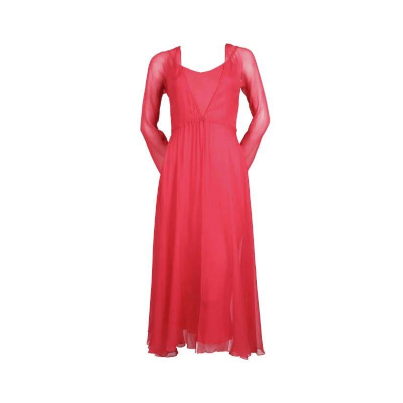 Bright pink 1970’s Halston pink midi slip and long sleeve sheer v-neck ruffle hem dress - can be worn together or separately. Brilliant color and movement. Long sleeve clasps in center so can be worn open as well.

Additional information:
Best fits