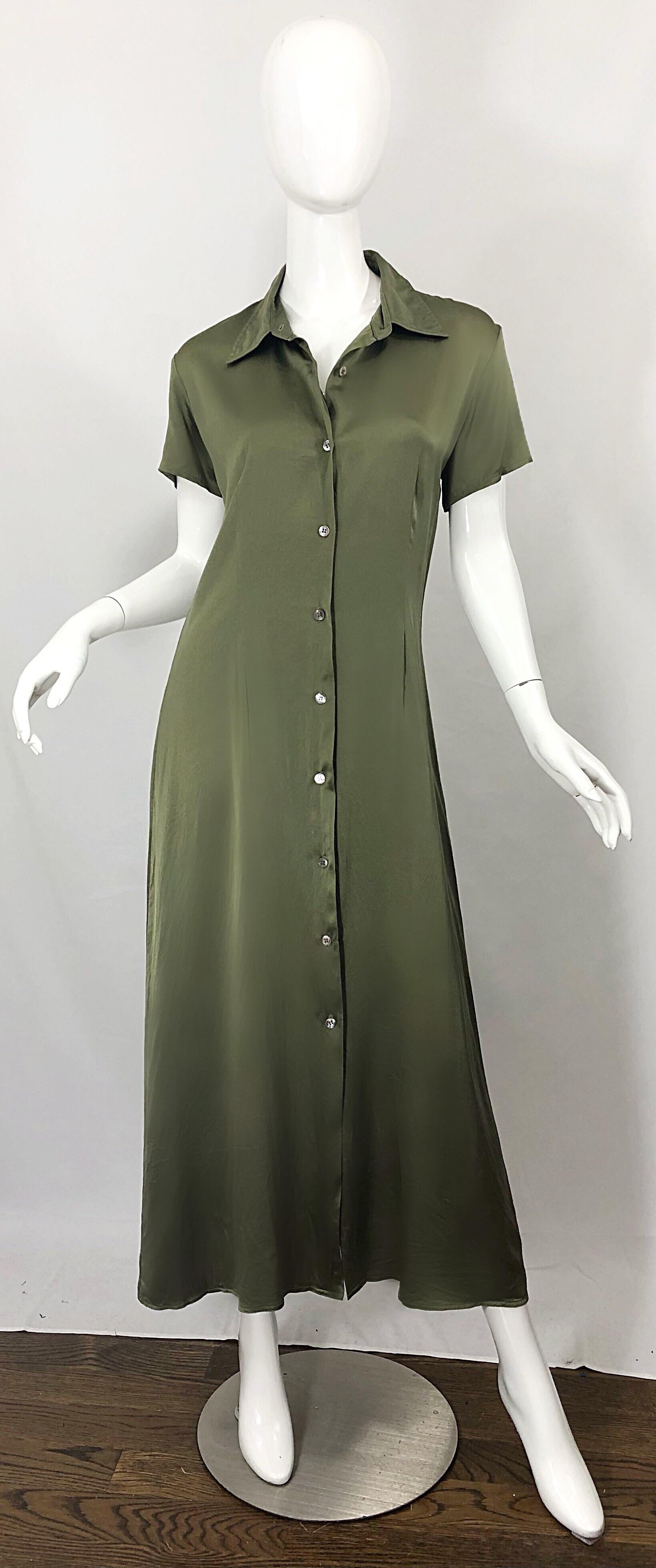 Effortlessly chic late 70s HALSTON olive green liquid silk maxi shirt dress! Features a tailored bodice with a forgiving flirty skirt Buttons up the front, and drapes the body beautifully. Can easily be dressed up or down, and is perfect for either