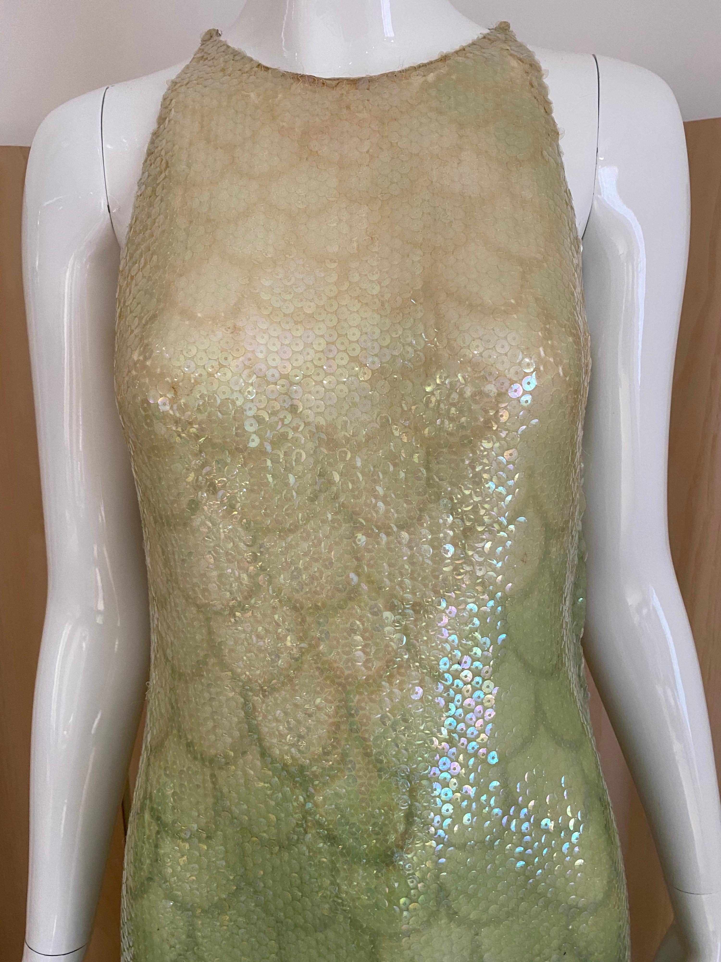 1970s Halston Ombré sleeveless sequin scalloped print iridescent dress.
Collectors item.
Fit size 0/2 (Xsmall)
Bust: 32”/ Waist: 25”/ Hip: 32”