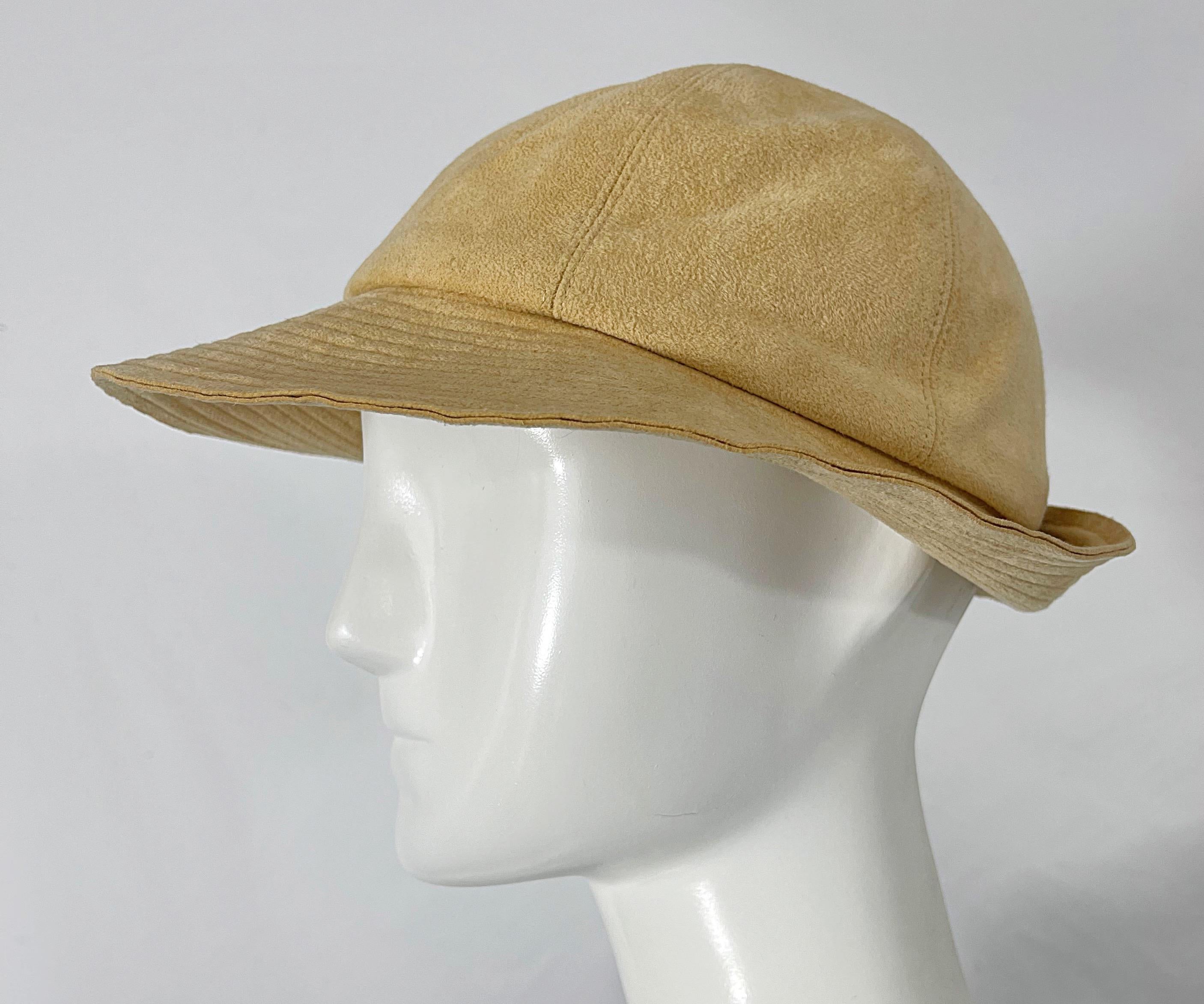 Chic 1970s HALSTON ultra suede tan fedora hat ! Features the soft versatile ultra suede Halston was known for. Can easily be washed in the washing machine ( on cold water and gentle cycle ). Pair this beauty with jeans or a dress. 
In great