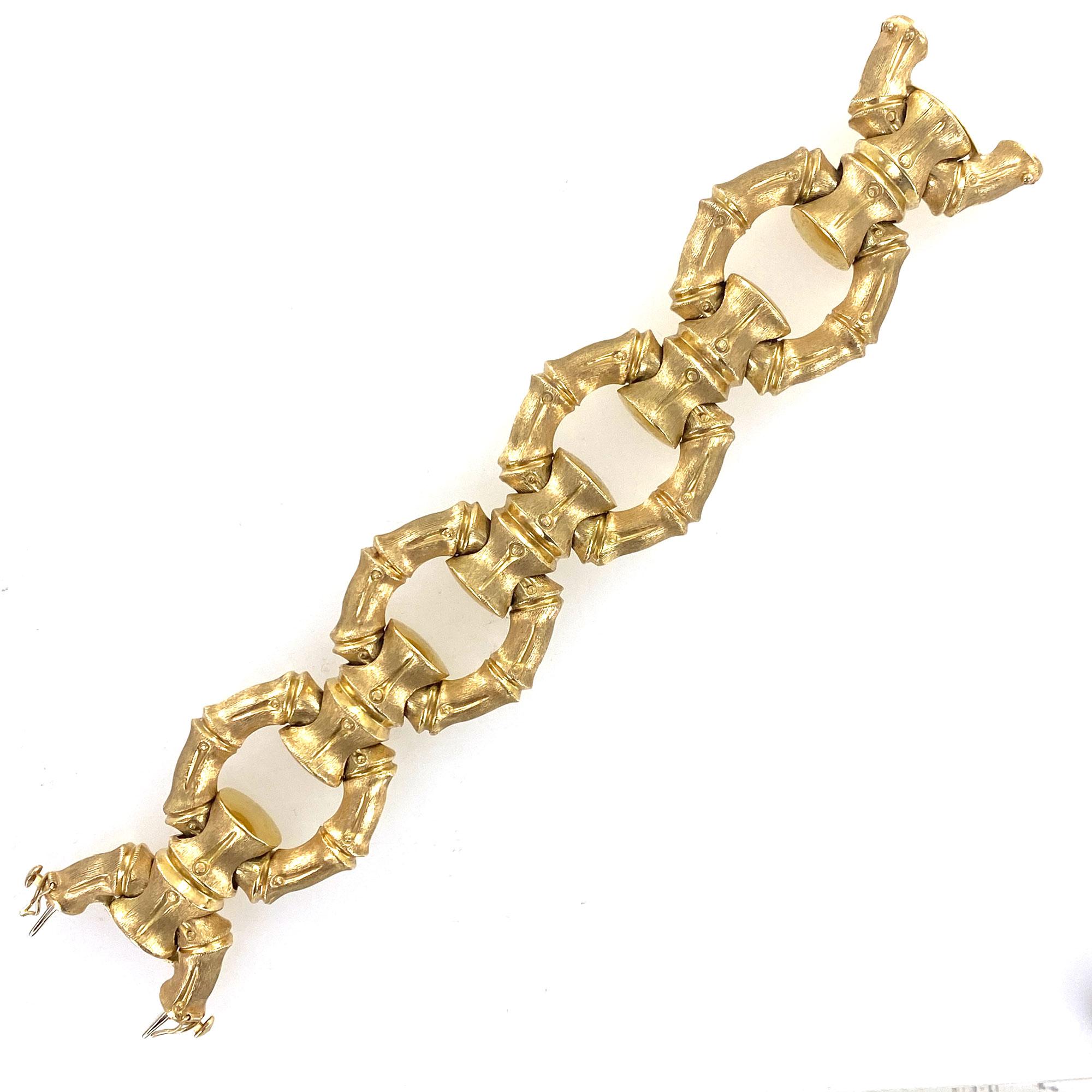 Fabulous bamboo link bracelet by Hammerman Brothers. The 1970's 18 karat yellow gold bracelet features a high polish side, a satin finish side, and measures 8.25 inches in length. Signed HB 18KT.