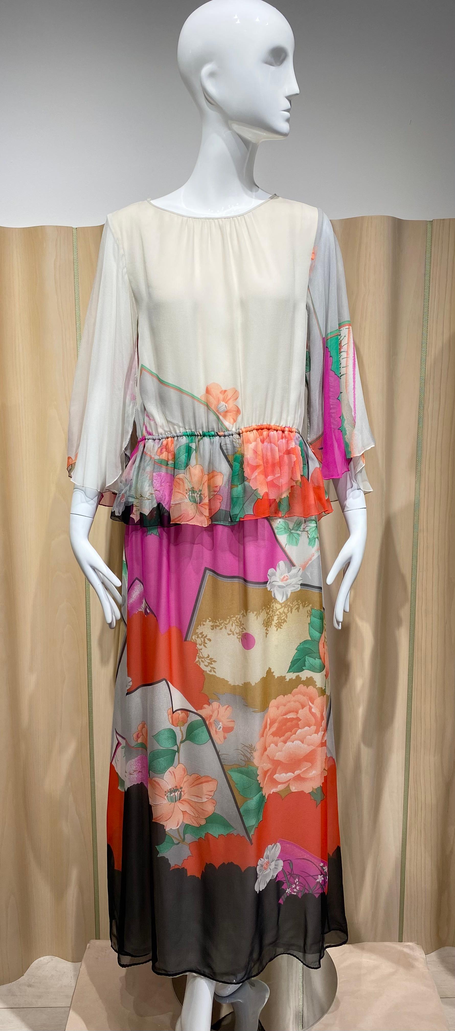 1970s Hanae Mori cream, pink, orange, green and pink floral print silk dress with orange silk sash/belt
-flutter sleeve
Size: Large
elastic waist
Bust 44 inches
Elastic waist stretch up to 34 inches