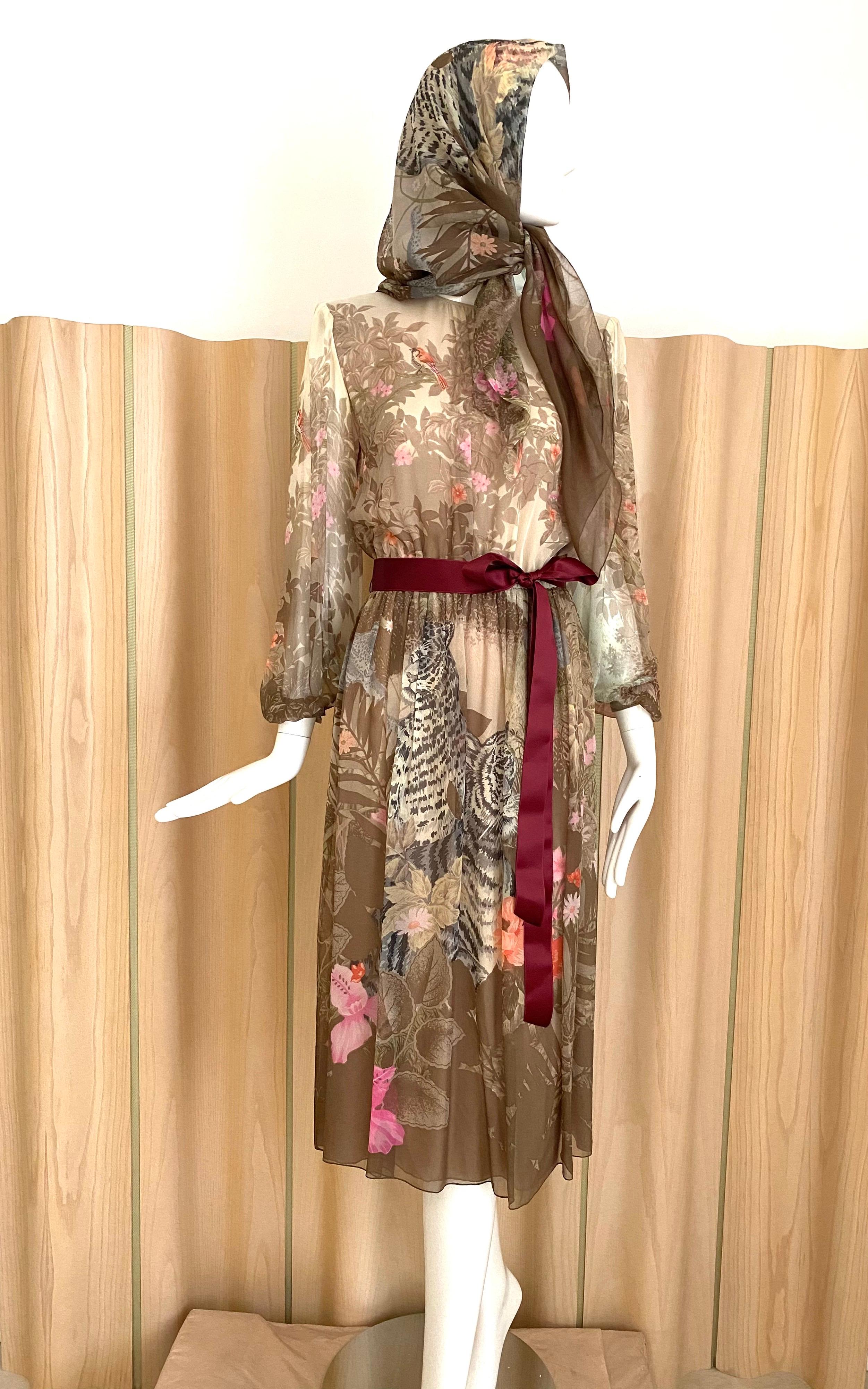 1970s Hanae Mori brown and pink tiger and floral print silk dress with Large silk scarf.
Size :  6
Bust: 36” / waist stretch up to 30” / Hip:  42” 