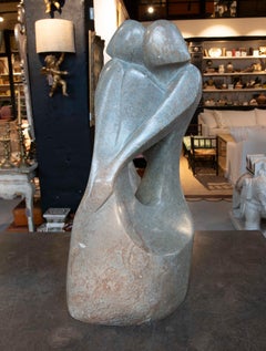 1970s Hand-carved Abstract Sculpture in Greenish Marble of an Embracing Couple