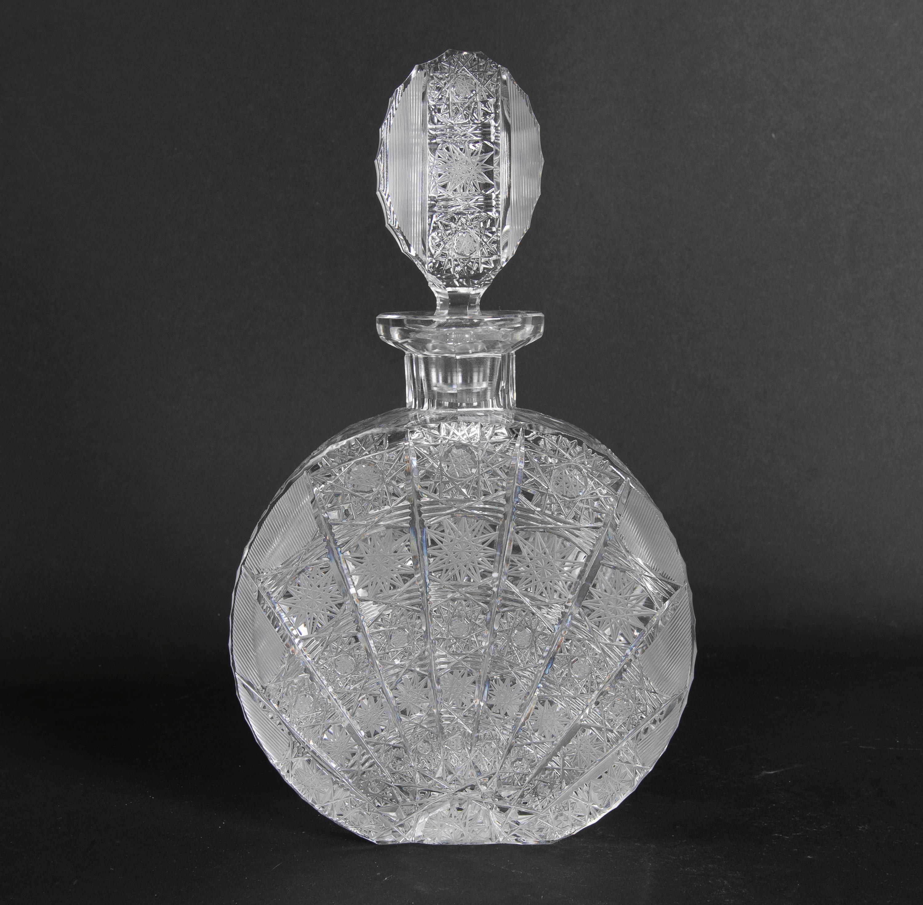 1970s hand-carved Bohemian crystal bottle.