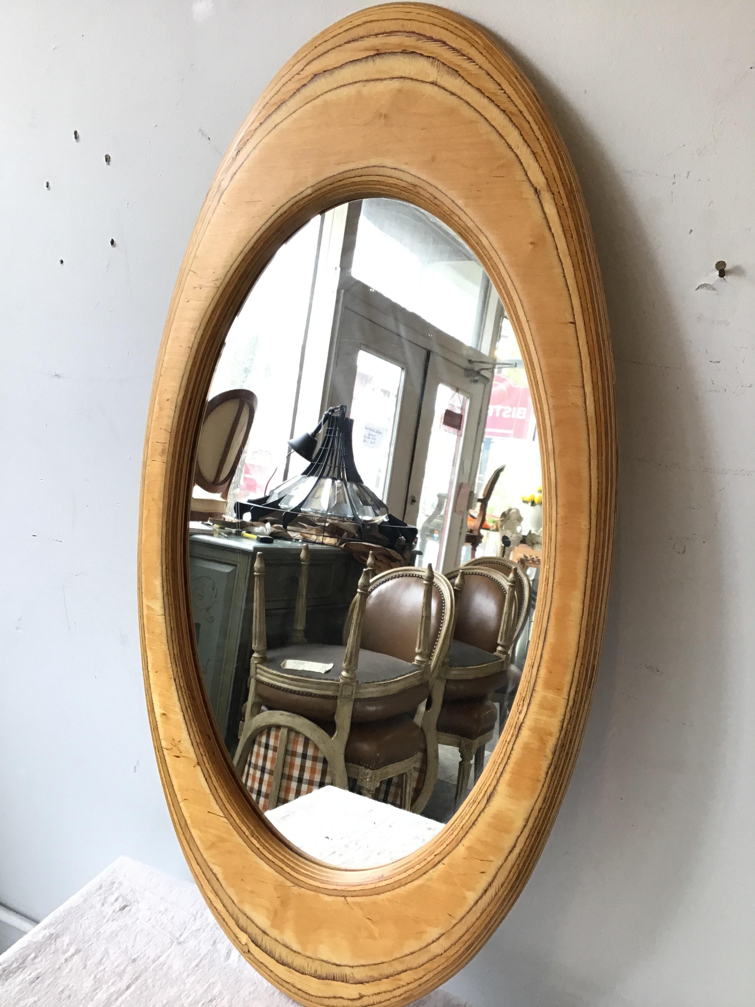 1970s handmade oval swirled wood mirror
