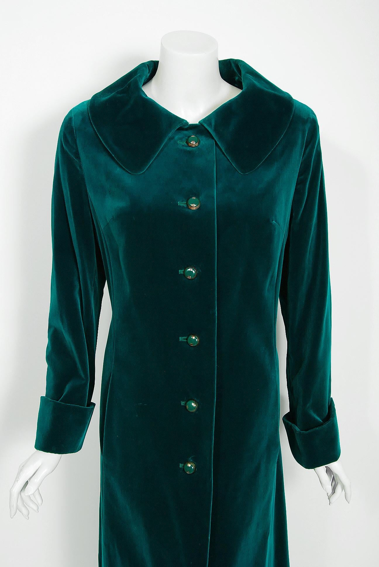 This ultra-chic early 1970's Harella of England maxi coat will make any woman shine during cold months ahead. The fabric itself is gorgeous; vibrant teal blue-green midweight cotton-velvet. I love the matching brass buttons and long, lean cuffed