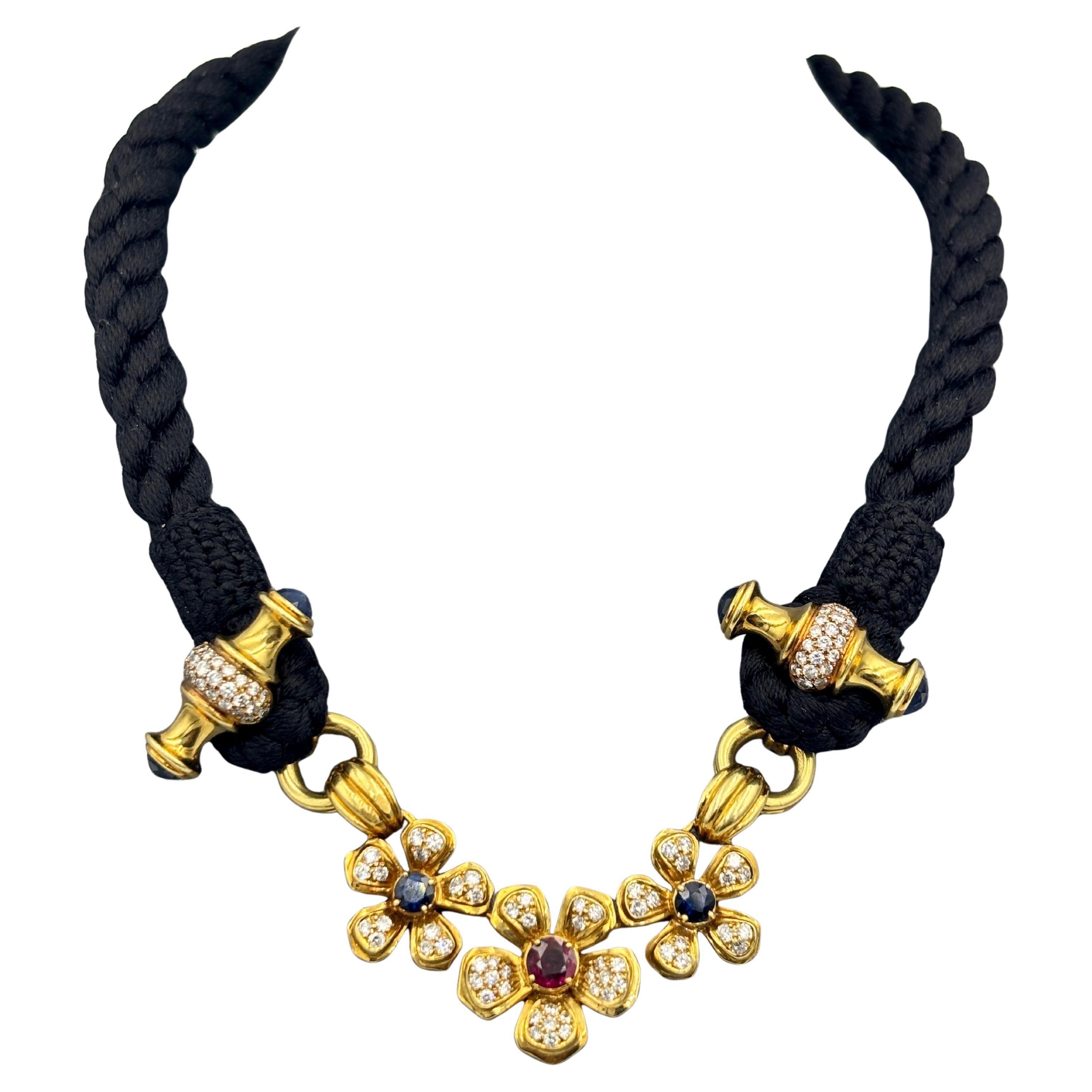 1970s Harry Winston 18k gold, ruby, sapphire and diamond choker on a black rope im Angebot