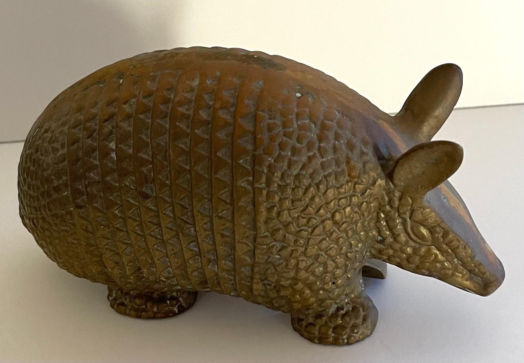 1970s heavy brass armadillo figurine. Could also be used as a door stop. No makers mark or signature.
