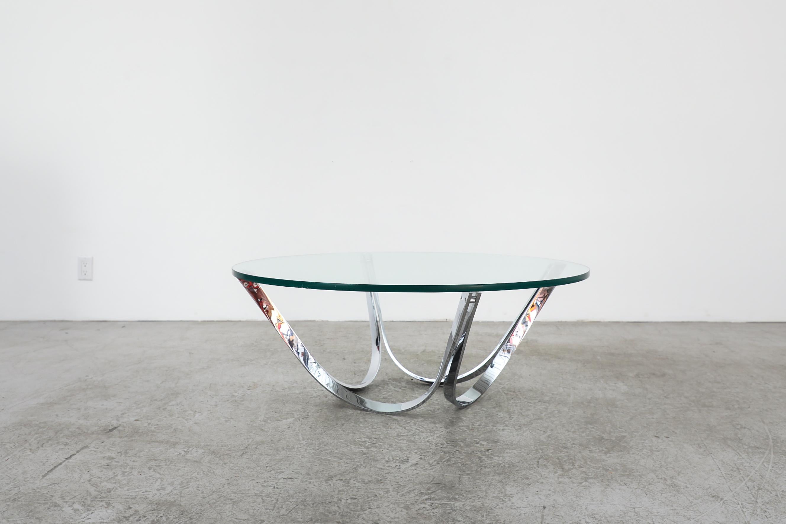 Dutch 1970's Heavy Chrome Coffee Table with Curved Base and Thick Plate Glass Top For Sale