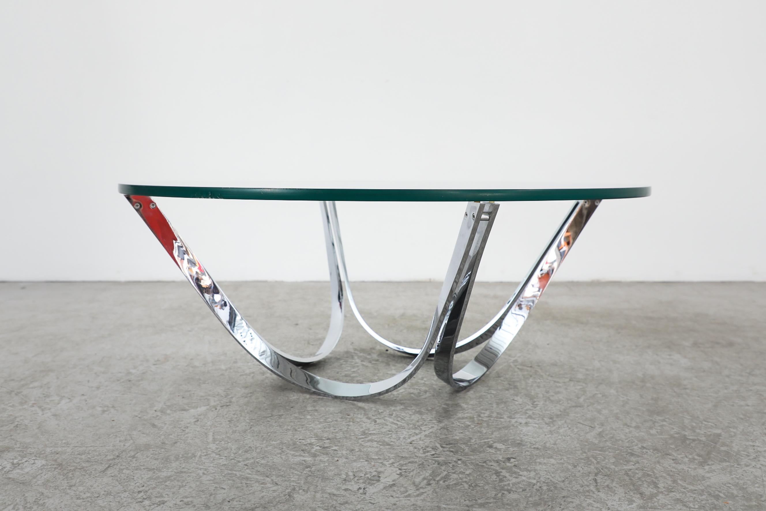 Late 20th Century 1970's Heavy Chrome Coffee Table with Curved Base and Thick Plate Glass Top For Sale