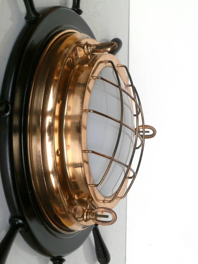 Modern 1970s Helm Nautical Wood Brass Wall Lamp For Sale