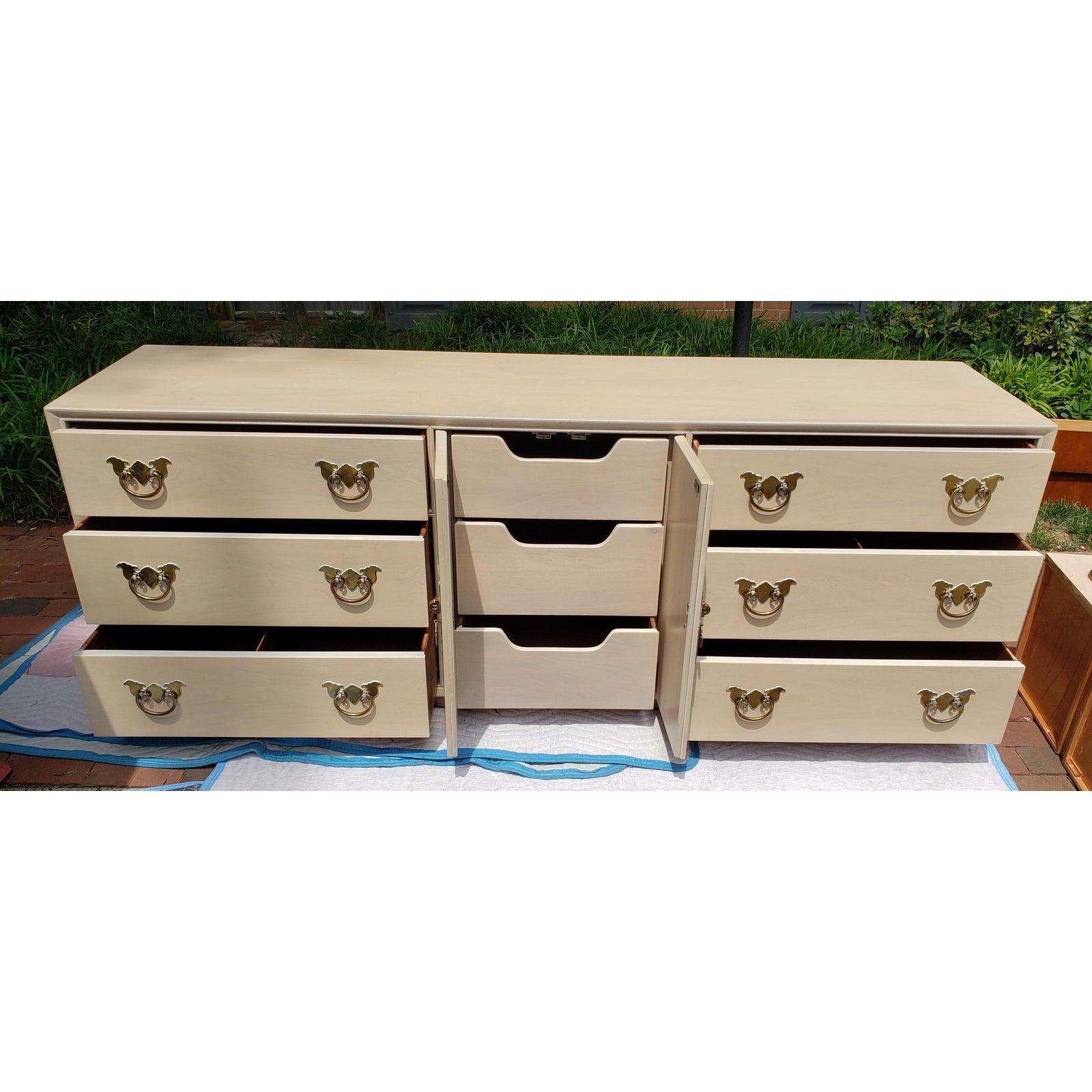 Vintage Henredon pan Asian campaign 9 drawer 2 door dresser sideboard with brass hardware. Original finish & hardware.

Measurements: 80W x 19D x 30H.
 