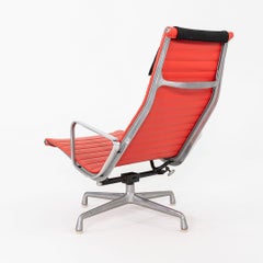 1970s Herman Miller Eames Lounge Chair in Red Naugahyde with Black Fabric Pillow