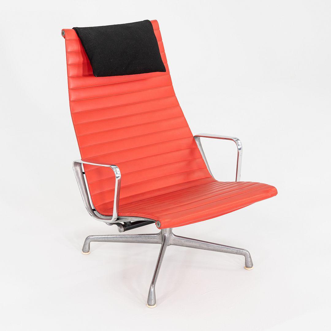 1970s Herman Miller Eames Lounge Chair in Red Naugahyde with Black Fabric Pillow In Good Condition For Sale In Philadelphia, PA