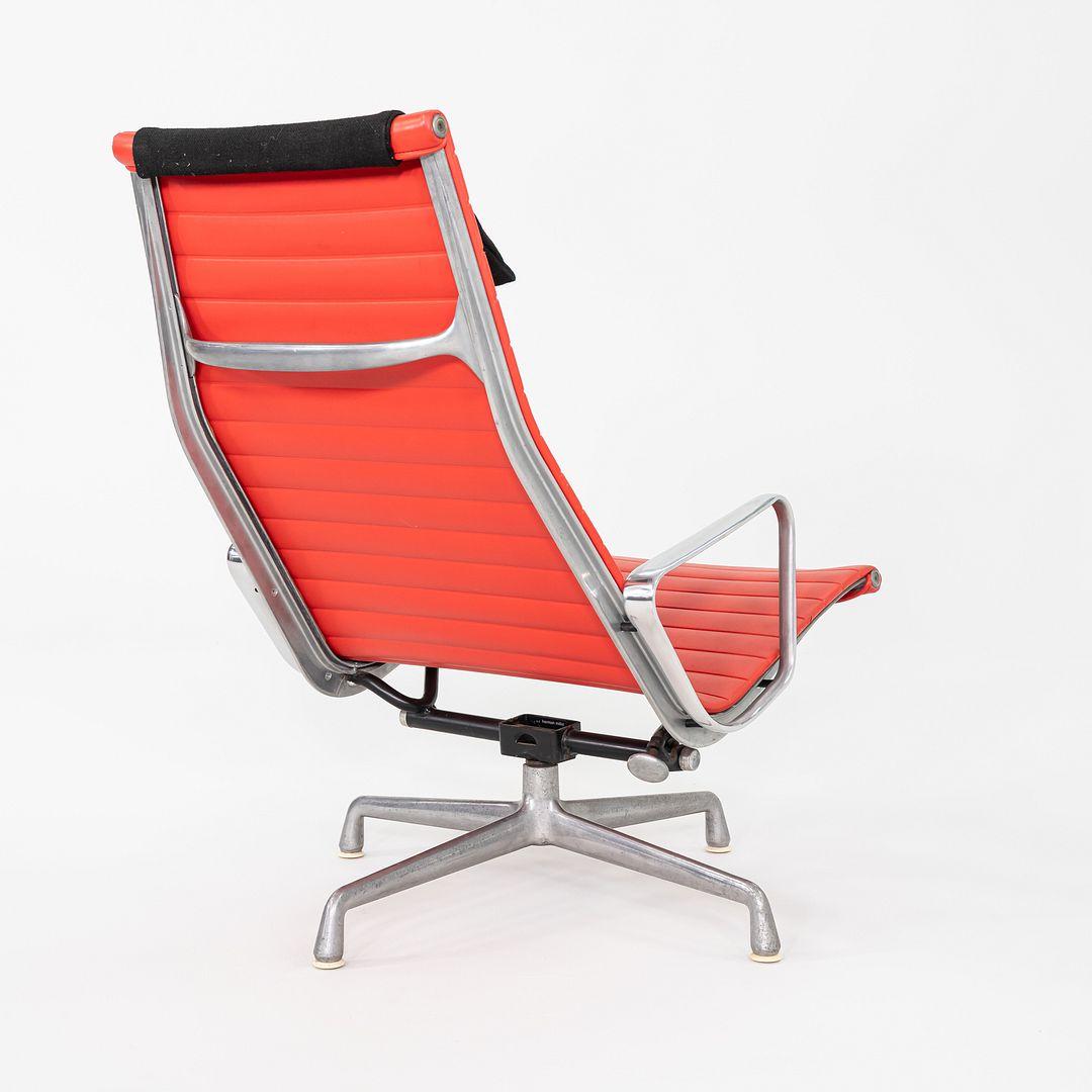 Leather 1970s Herman Miller Eames Lounge Chair in Red Naugahyde with Black Fabric Pillow For Sale