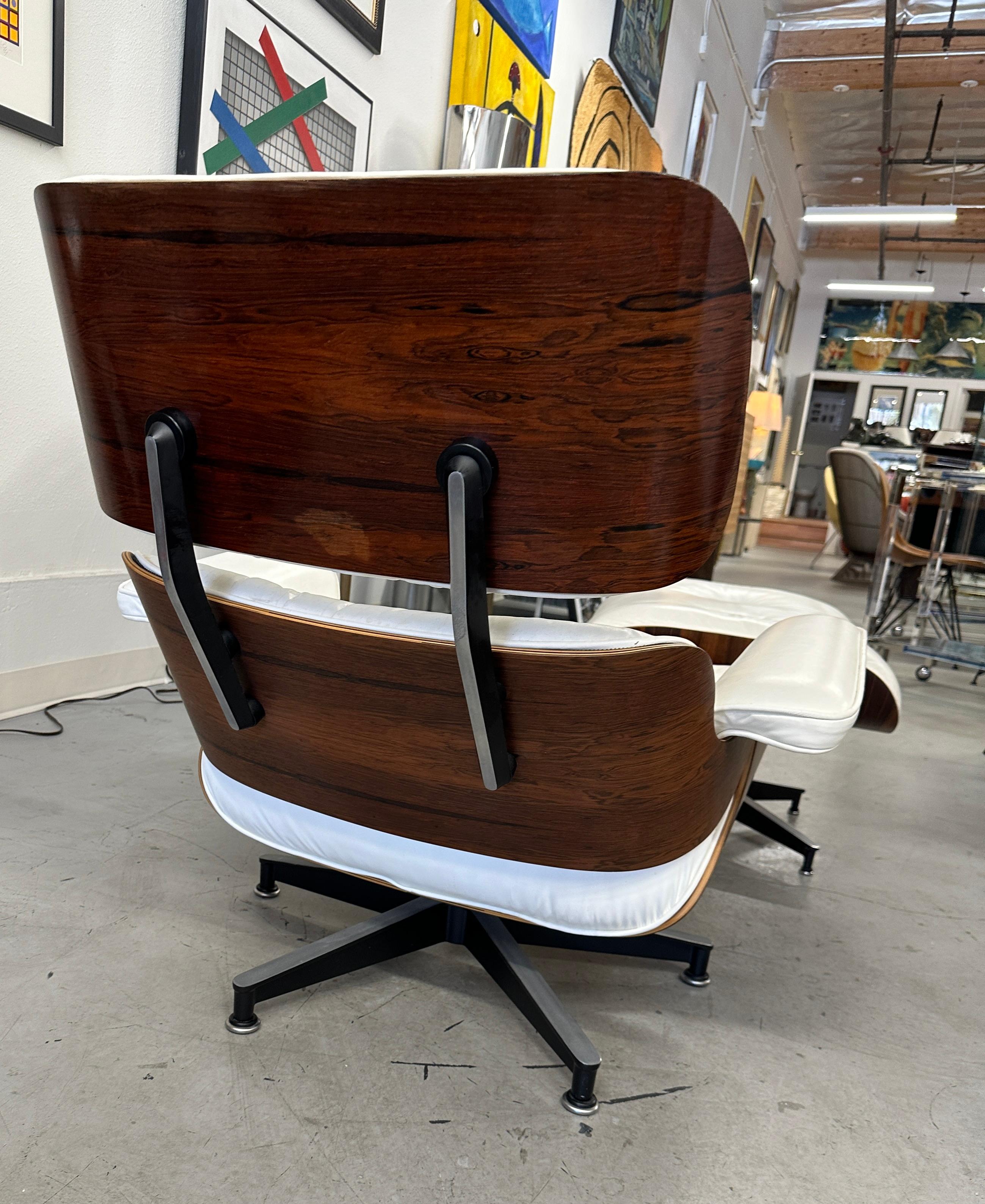 American 1970's Herman Miller Eames Rosewood & White Leather Lounge Chair & Ottoman For Sale