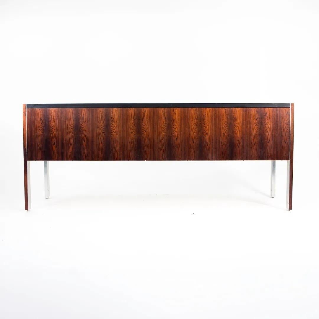 This is a rosewood credenza produced for Herman Miller by Biltrite of Canada. Biltrite was seemingly an authorized manufacturer in canada for Herman Miller designs. The piece dates to circa 1978 and is beautifully constructed. It has aluminum