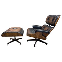 1970’s Herman Miller Rosewood Eames Lounge Chair 
Ottoman