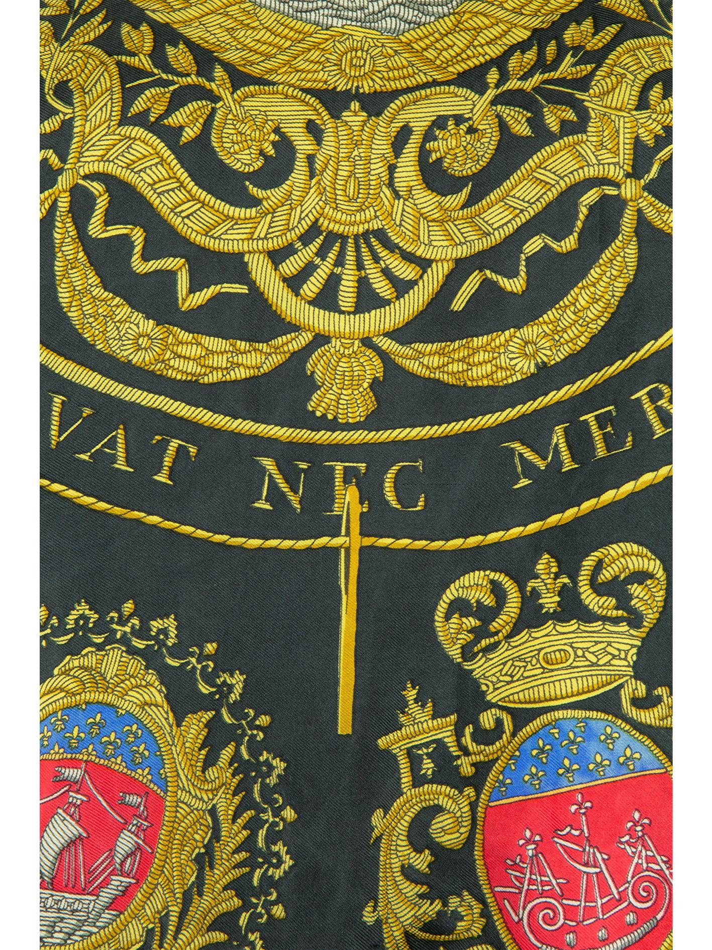 A 1970s Hermès sweater with a silk printed panel at the front. This panel features a ship towards the top; with the words “ Fluctuat Nec Mergitur”, which translates to (