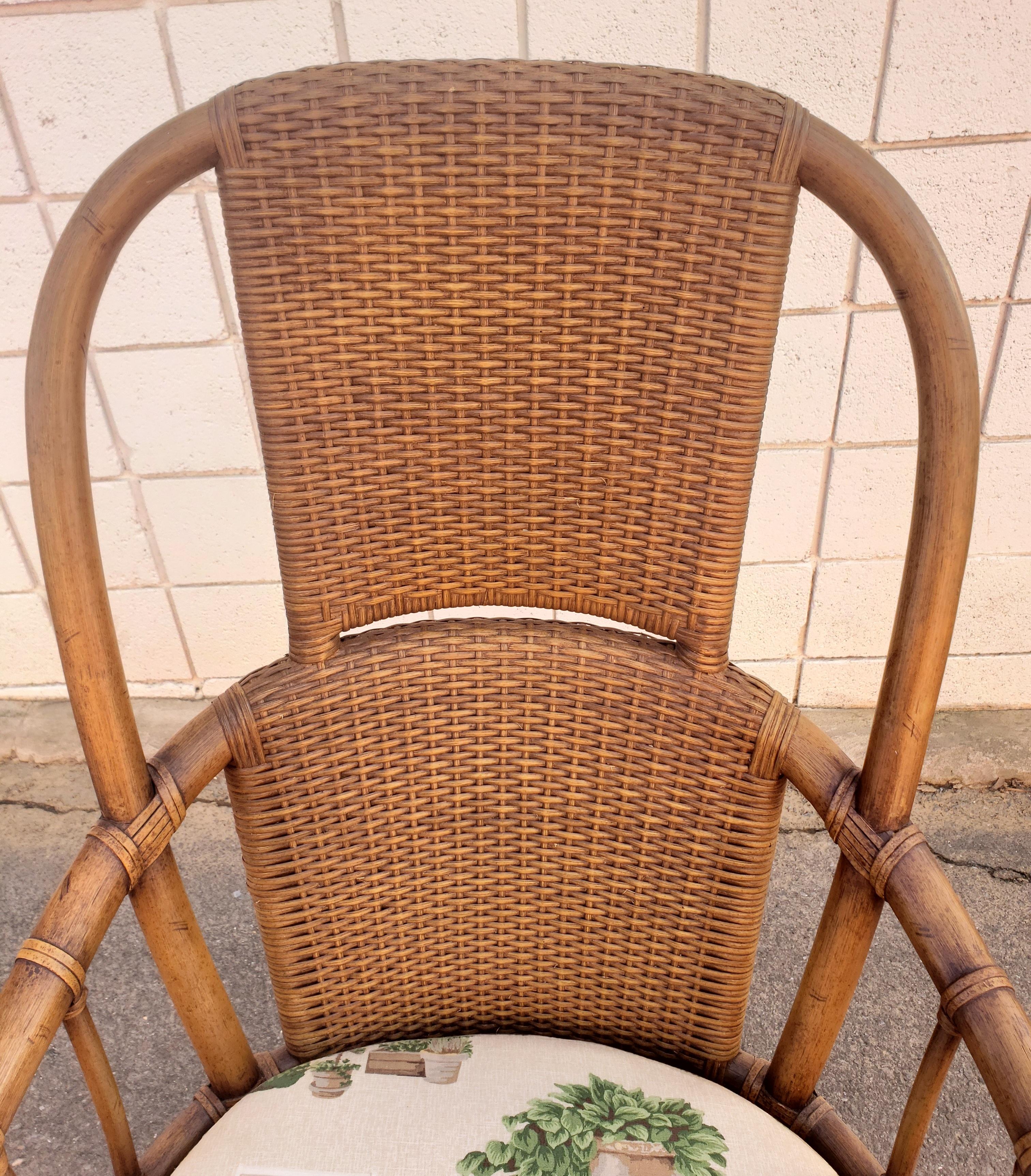 American 1970s High Hoop Back Rattan and Leather Straps Arm Chairs, a Pair For Sale