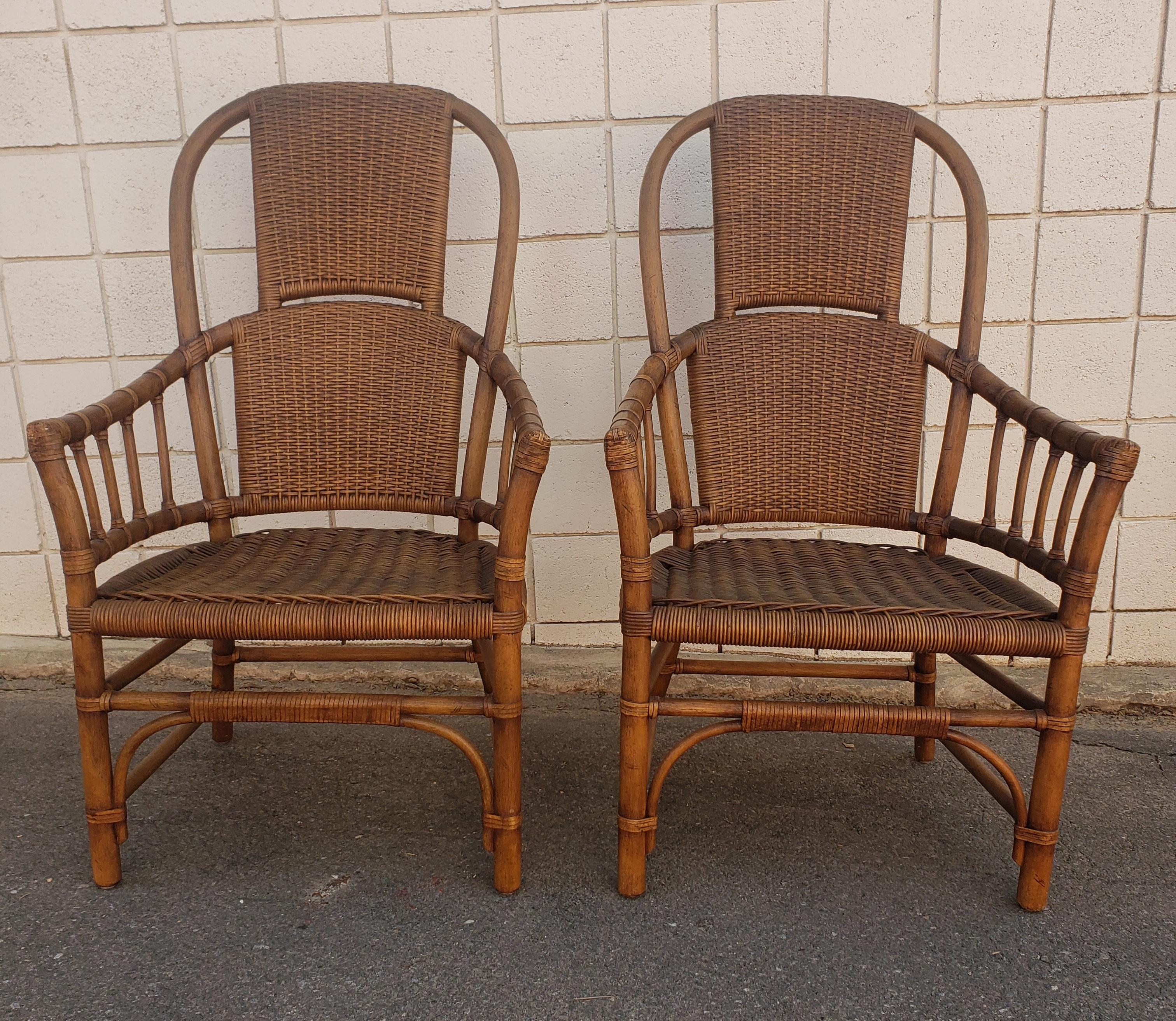 Hand-Crafted 1970s High Hoop Back Rattan and Leather Straps Arm Chairs, a Pair For Sale