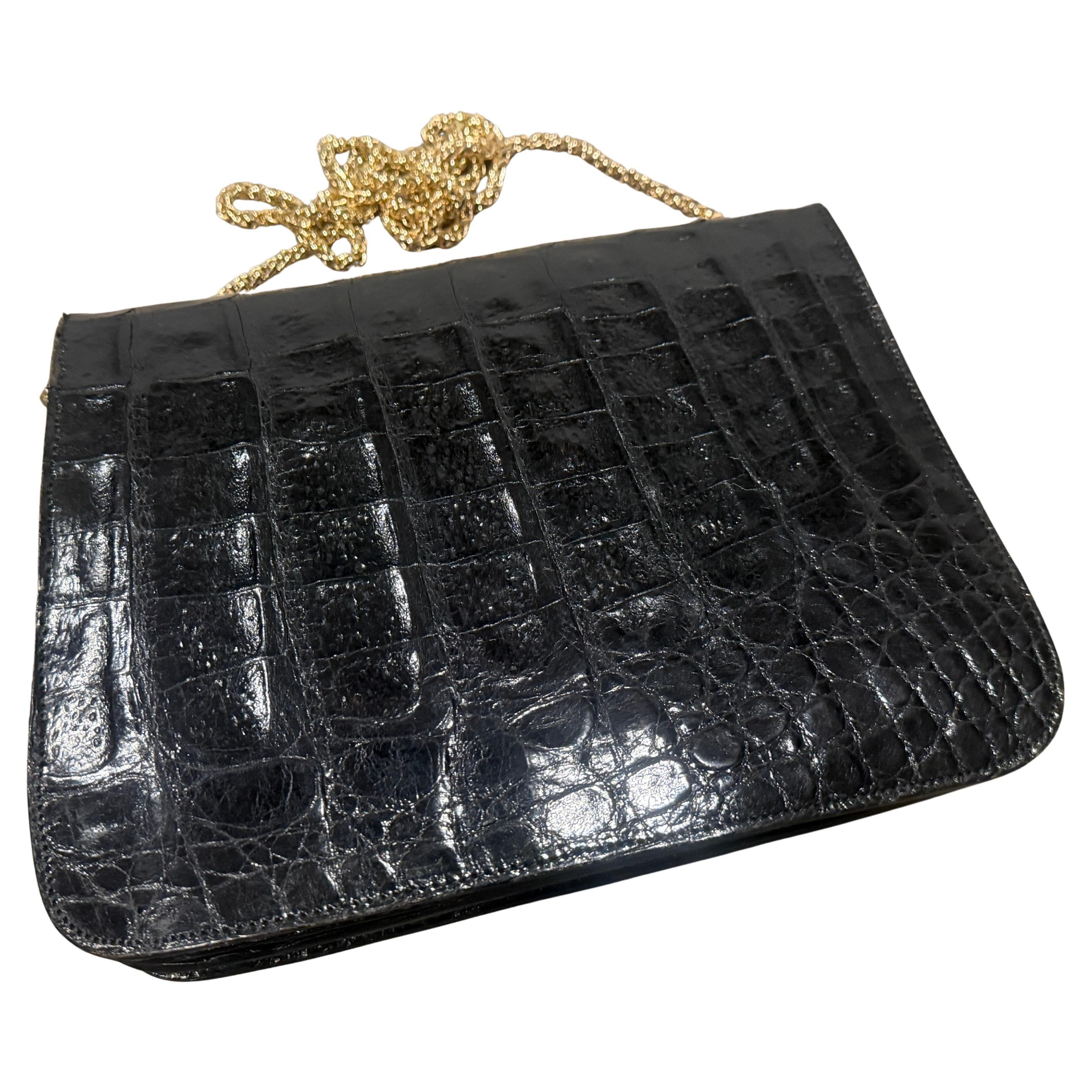 1970s High Quality Vintage Black Leather and Brass italian Shoulder Bag