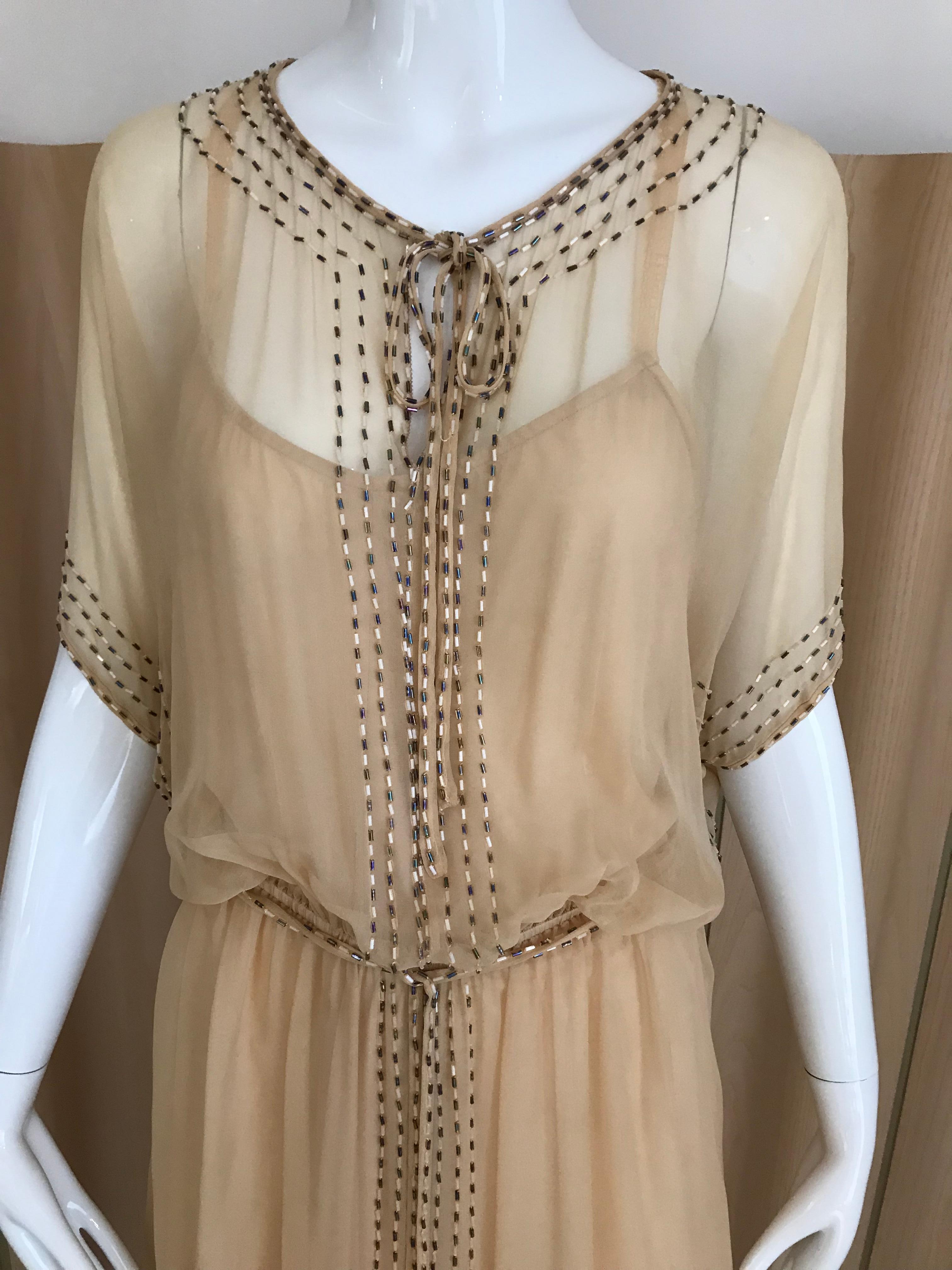 Vintage 70s Creme - nude silk chiffon Holly Harp Dress with beads
Bust: 40 inches/ Elastic waist stretch up to 38”