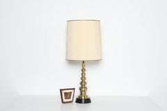 1970s Hollywood Regency Brass Candlestick Lamp on Black Lacquered Base