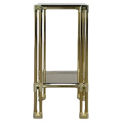 1970s Hollywood Regency Design Brass and Smoked Glass Pedestal Table 1970s Hollywood Regency Design Brass and Smoked Glass Pedestal Table