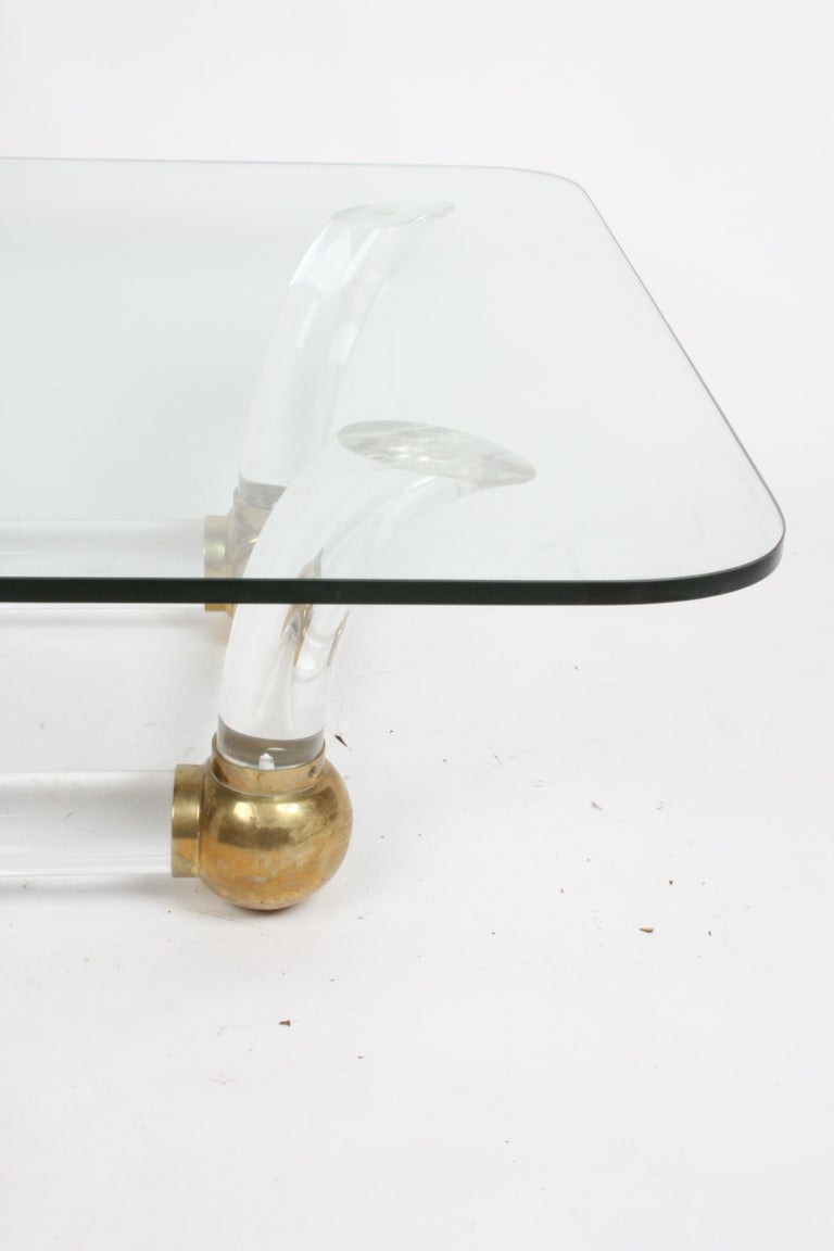 Late 20th Century 1970s Hollywood Regency Lucite Tusk & Brass Ball Springer Style Coffee Table For Sale