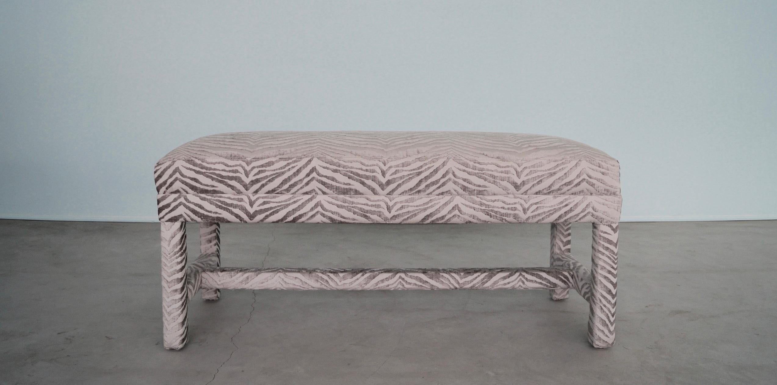We have this gorgeous vintage Mid-century Modern designer bench for sale. It has been professionally reupholstered in a designer textured chenille, and looks outstanding! It's a parsons bench, and the fabric is incredibly stunning! It's a
