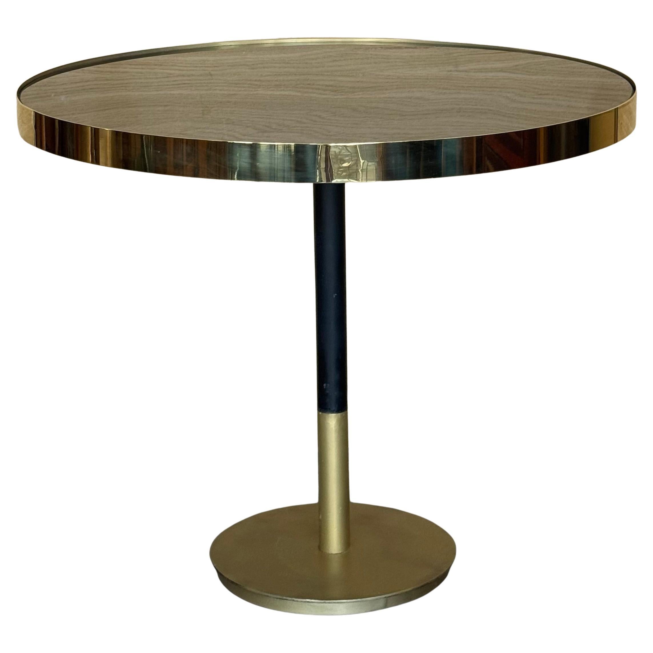 Mesa de centro o comedor redonda de latón voladiza estilo Hollywood Regency de los años 70