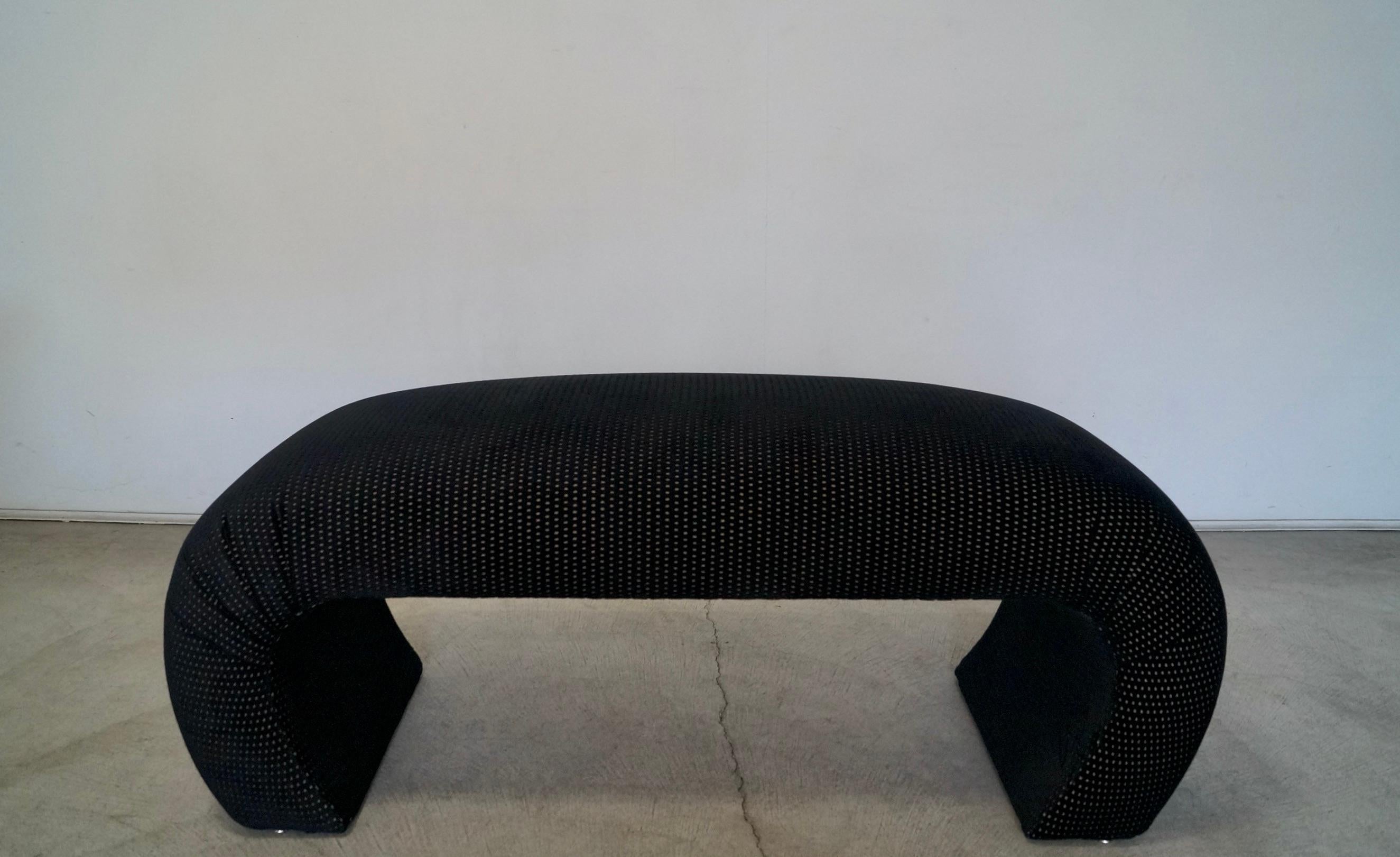 Vintage 1970s Hollywood Regency Post modern bench for sale. It's in the manner of Karl Springer, and has been professionally reupholstered in new velvet and foam. The velvet is special and is raised velvet with a gold backdrop pattern. It's a solid