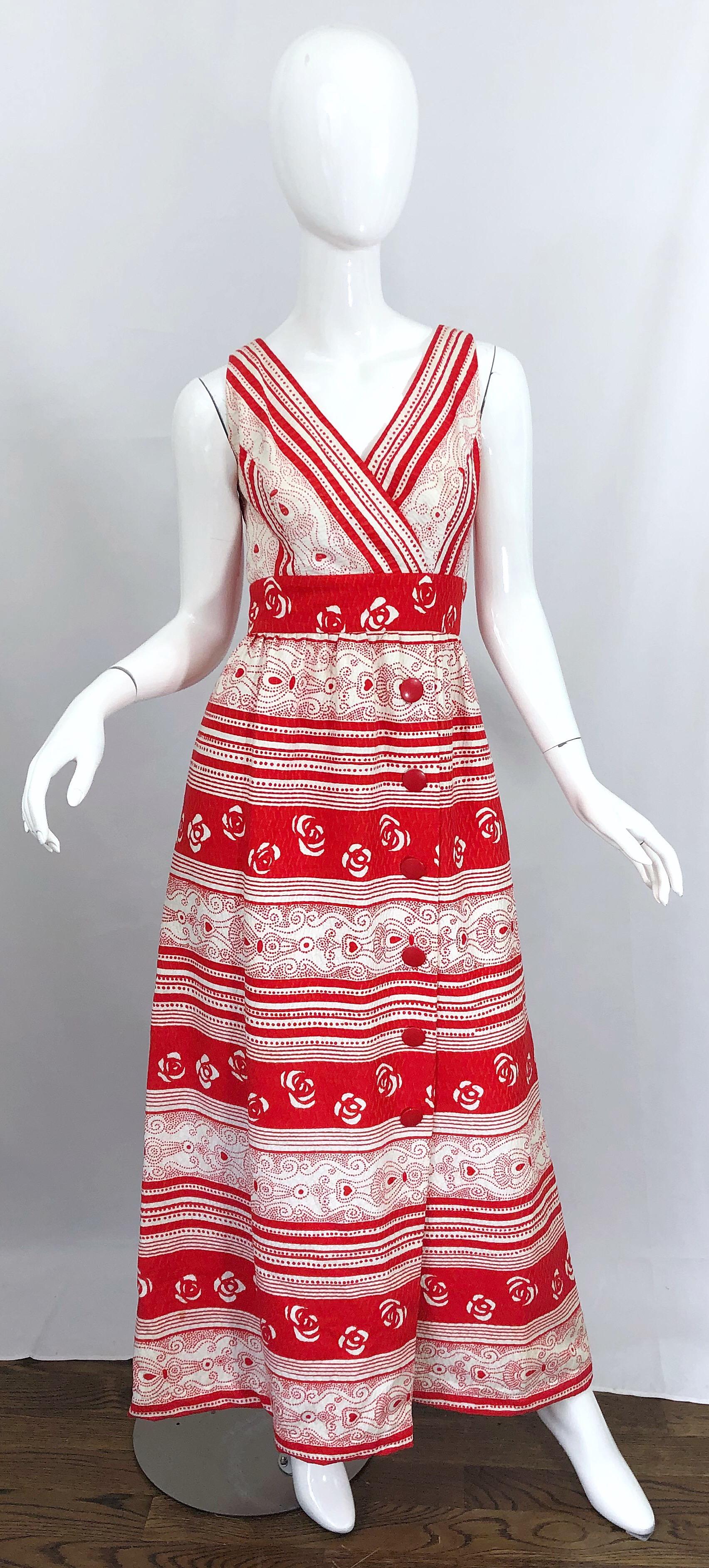 Chic early 70s HUEY WALTZER for MANNEQUIN red and white heart and flower print pique cotton sleeveless maxi dress! Features lipstick red and white throughout on a soft thick cotton. Red lacquer mock buttons up the left side of the skirt. Full metal