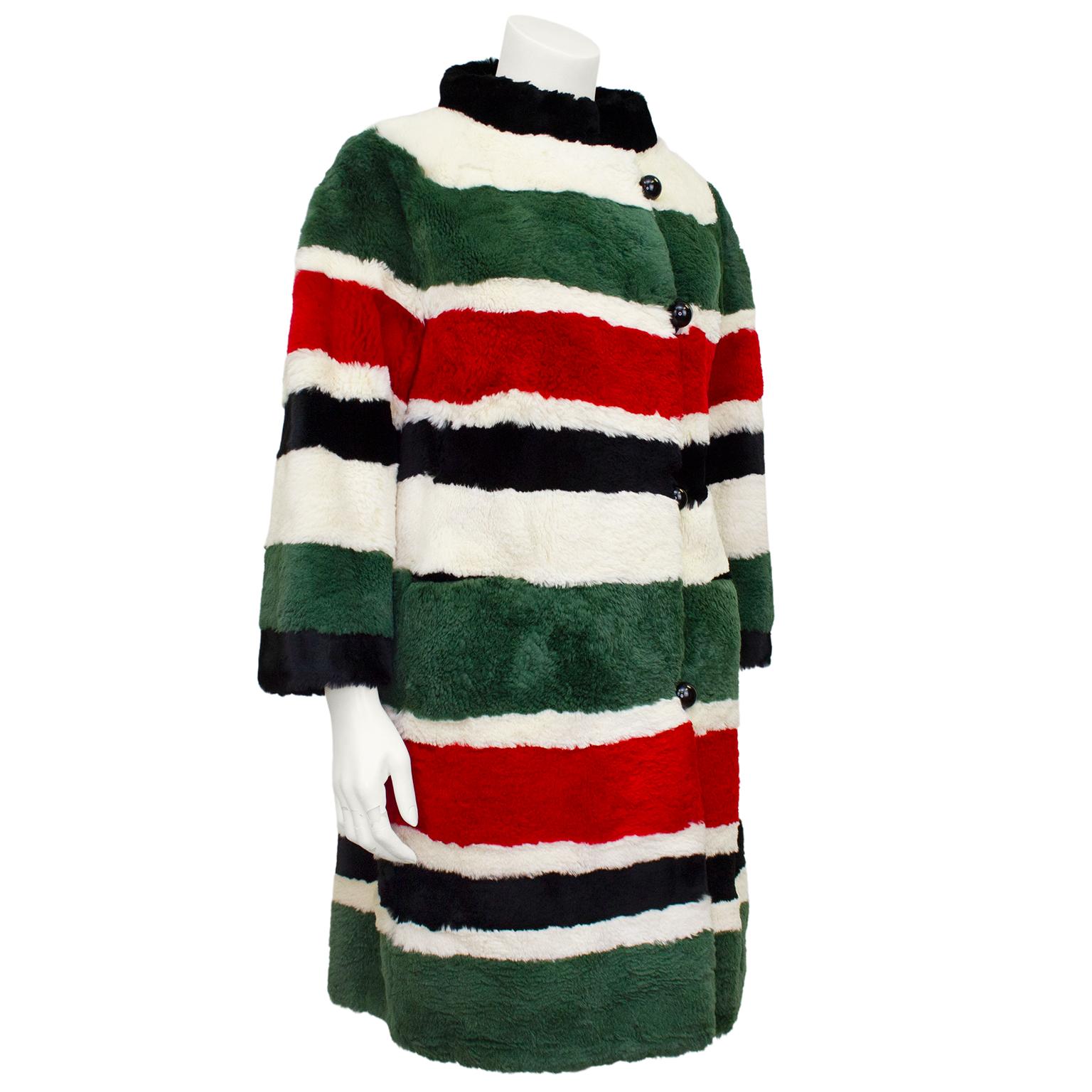 Stunning one-of-a-kind cream, red, green and black sheared beaver mini coat from I Magnin Fur Salon. Dating from 1970’s, perfect for someone looking for an excellent condition whimsical winter coat. Raised collar, stunning oversized black resin ball