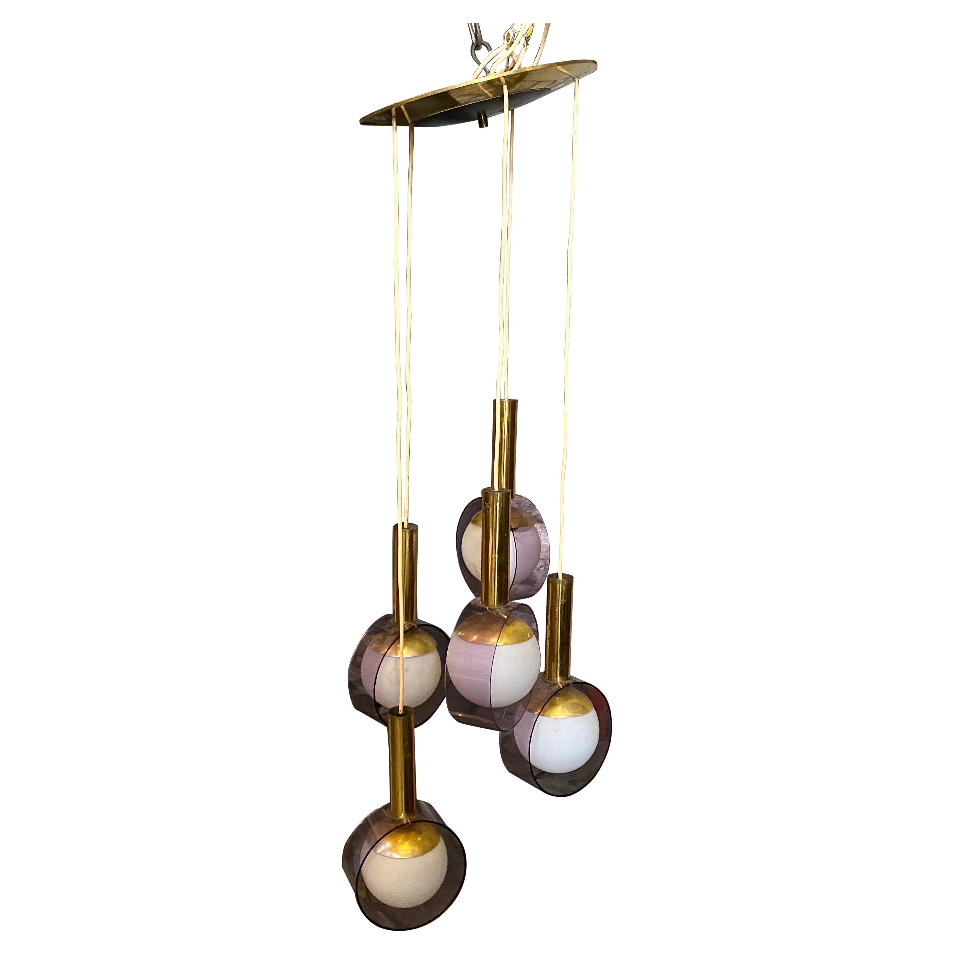 1970s Iconic Mid-Century Modern Cascading Lucite and Brass Chandelier by Stilux For Sale