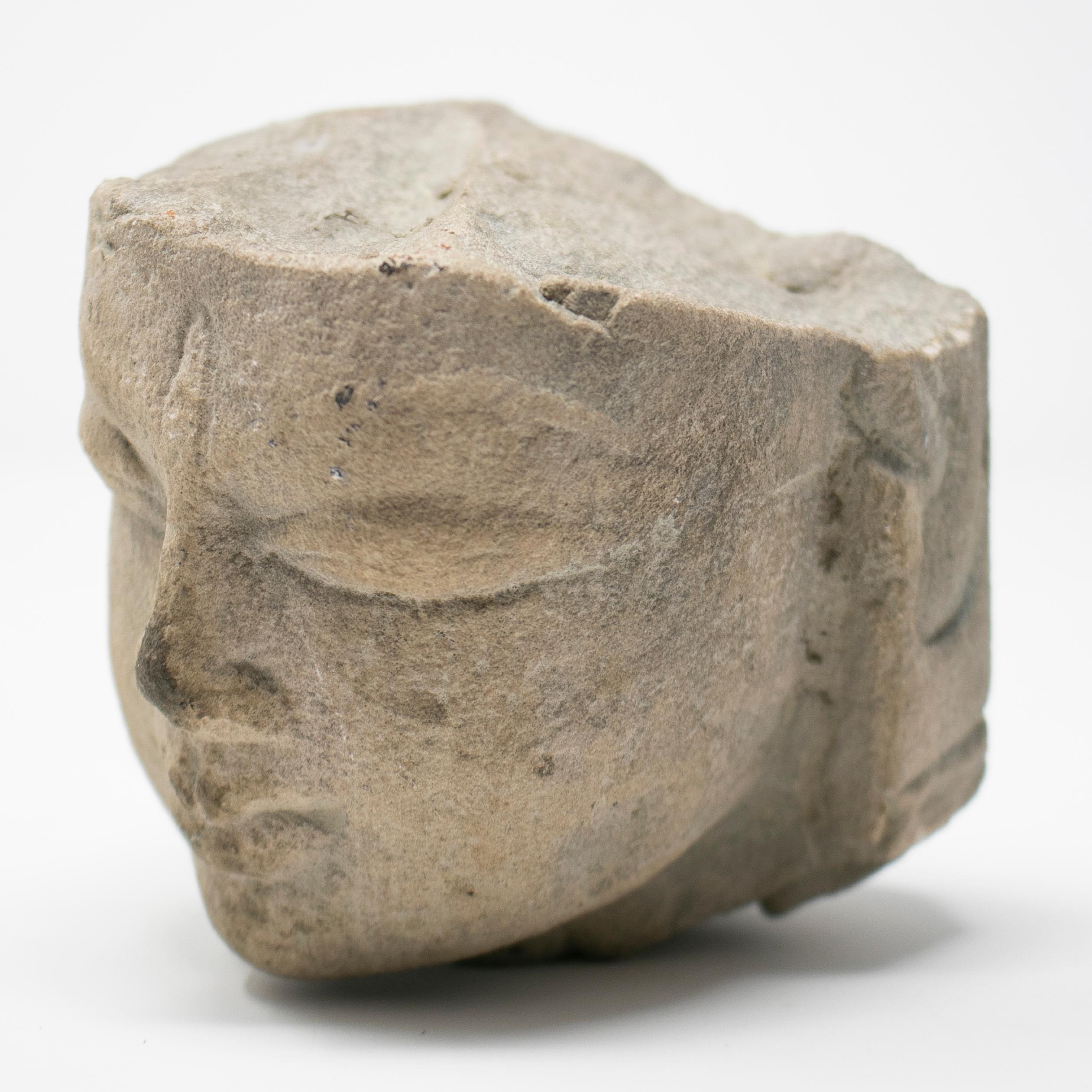 native american stone face carvings