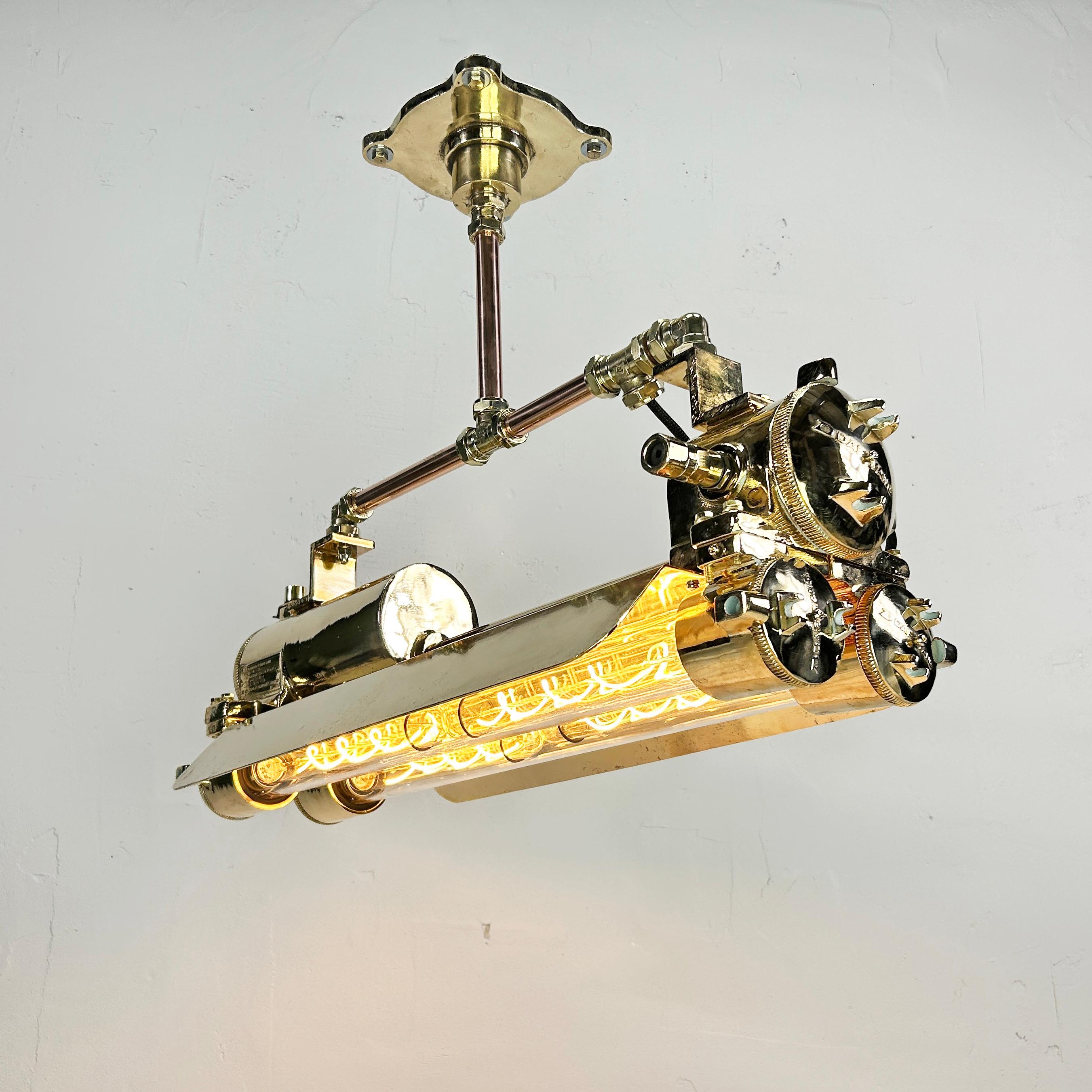 The brass industrial strip light is a vintage flameproof ceiling light manufactured c1970 by South Korean company Daeyang. Originally this nautical ceiling light was found in the engine rooms of decommissioned ships. Salvaged and professionally