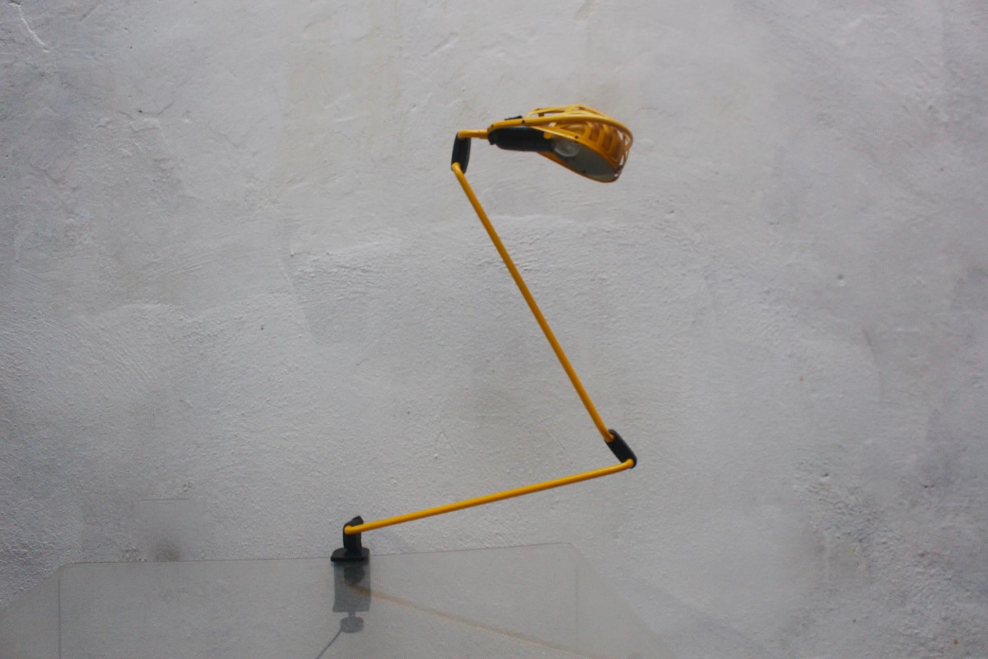 Postmodern Industrial articulated desk lamp designed by Tommaso Cimini and produced by Lumina in Italy, circa 1970.