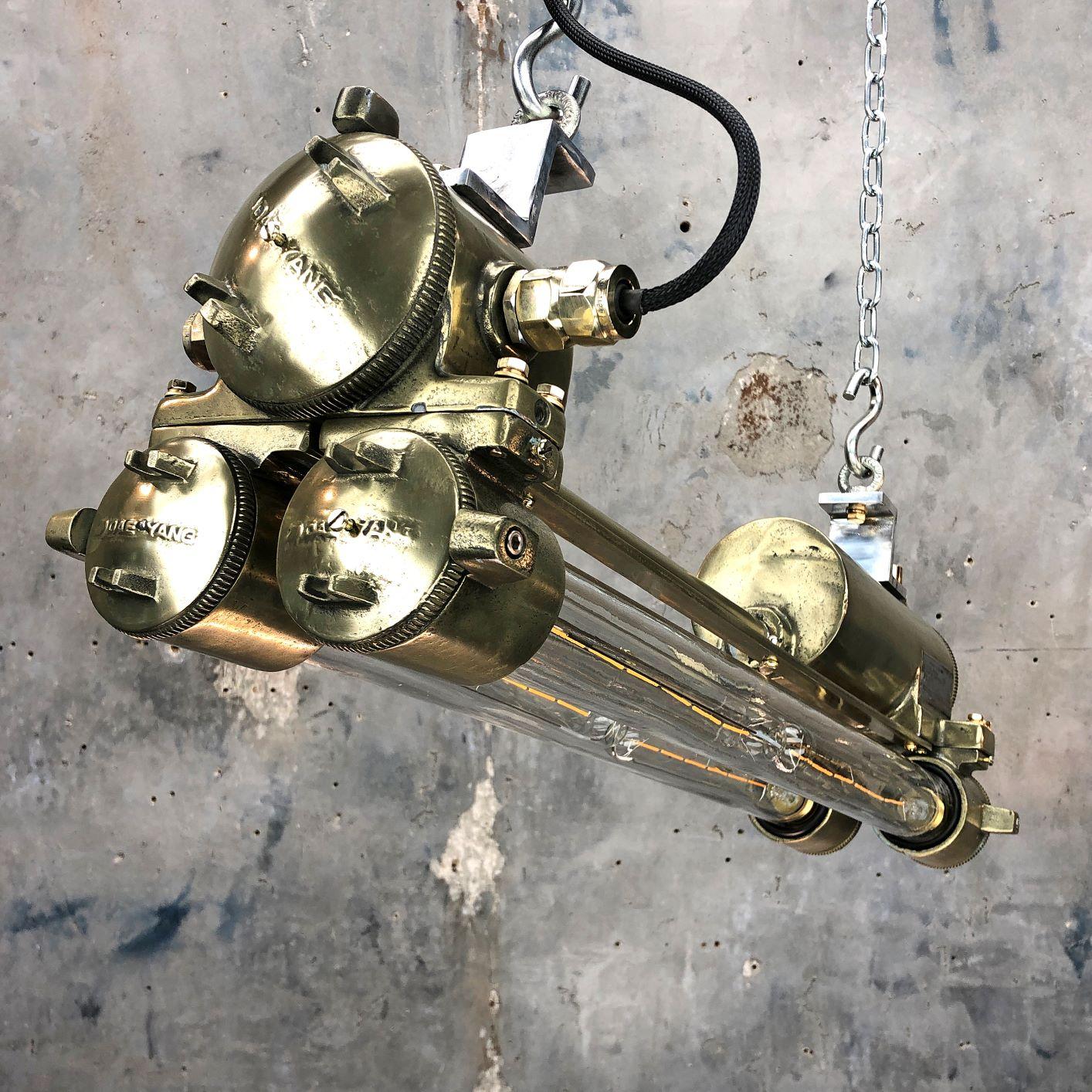 Tempered 1970s Industrial Polished Brass and Glass Flameproof Edison Striplight For Sale