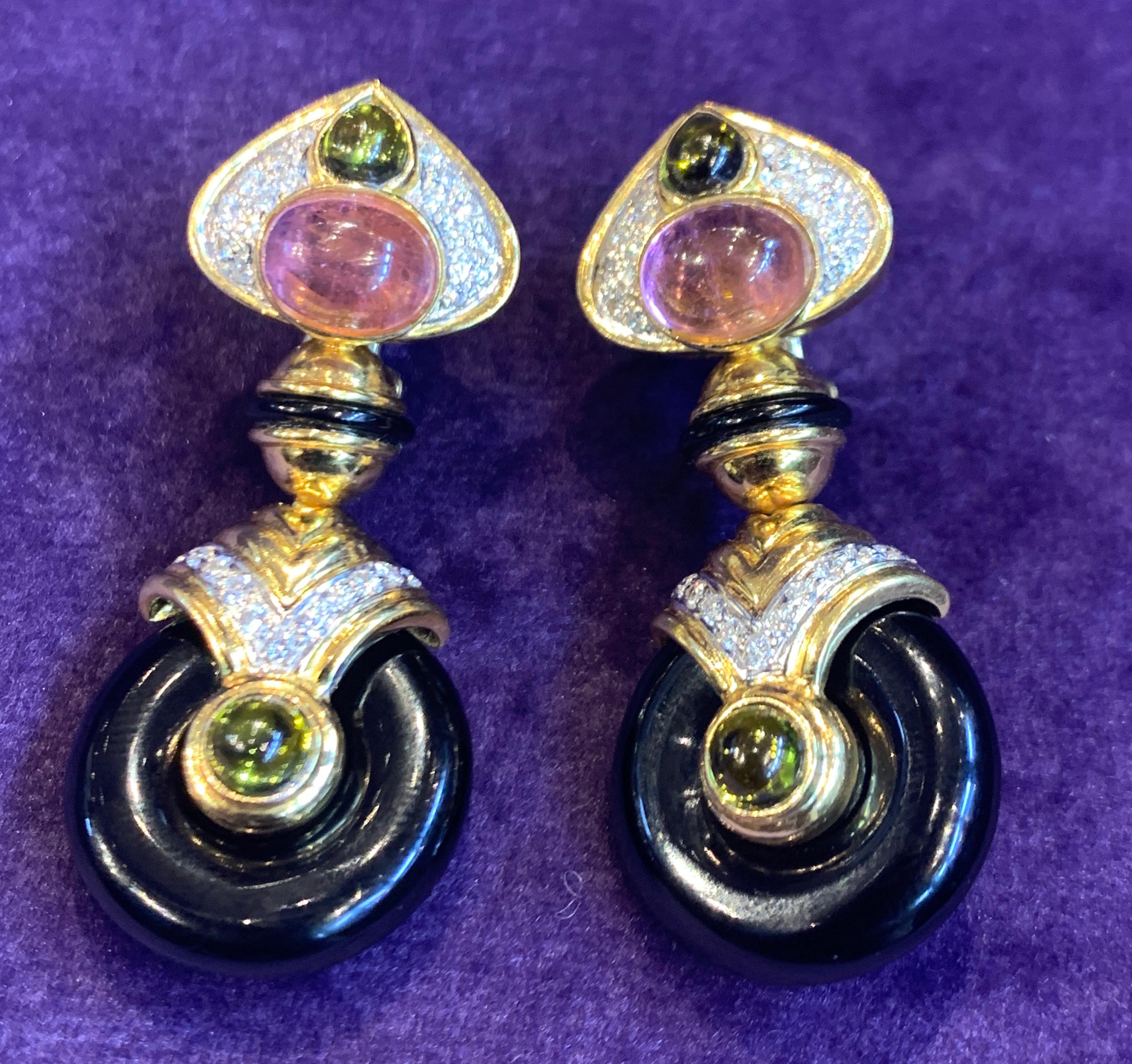 Multi Gem Gold Dangle Earrings with 4 changeable drops  including  amethyst , onyx, citrine & mother of pearl
Measurements: 1.75