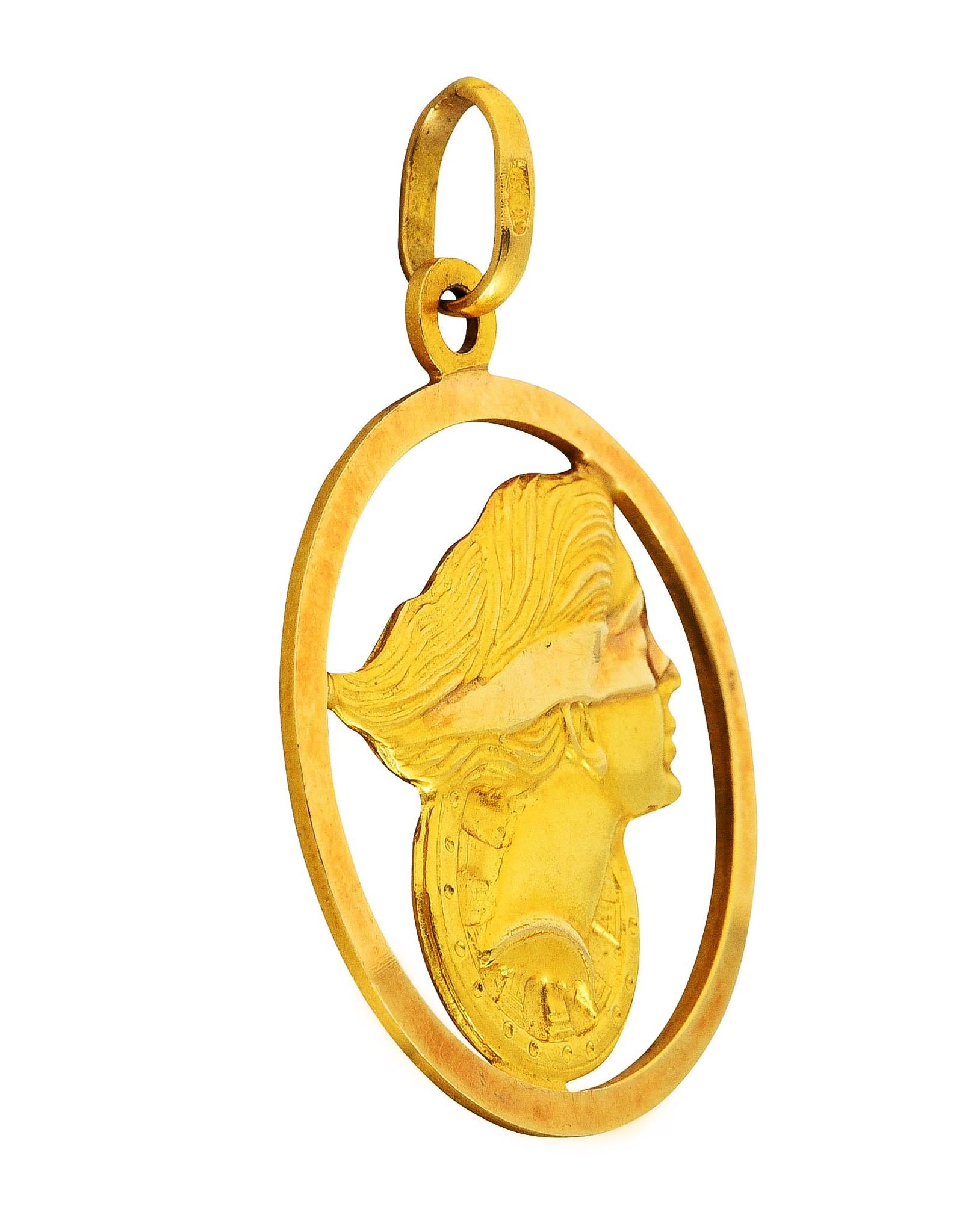Pendant design as circular framed depiction of the Roman goddess Fortuna 

Fortuna is depicted as profile of a blindfolded woman in front of the wheel of fortune 

Featuring matte gold engraved hair and wheel with high polished blindfold 

Fortuna