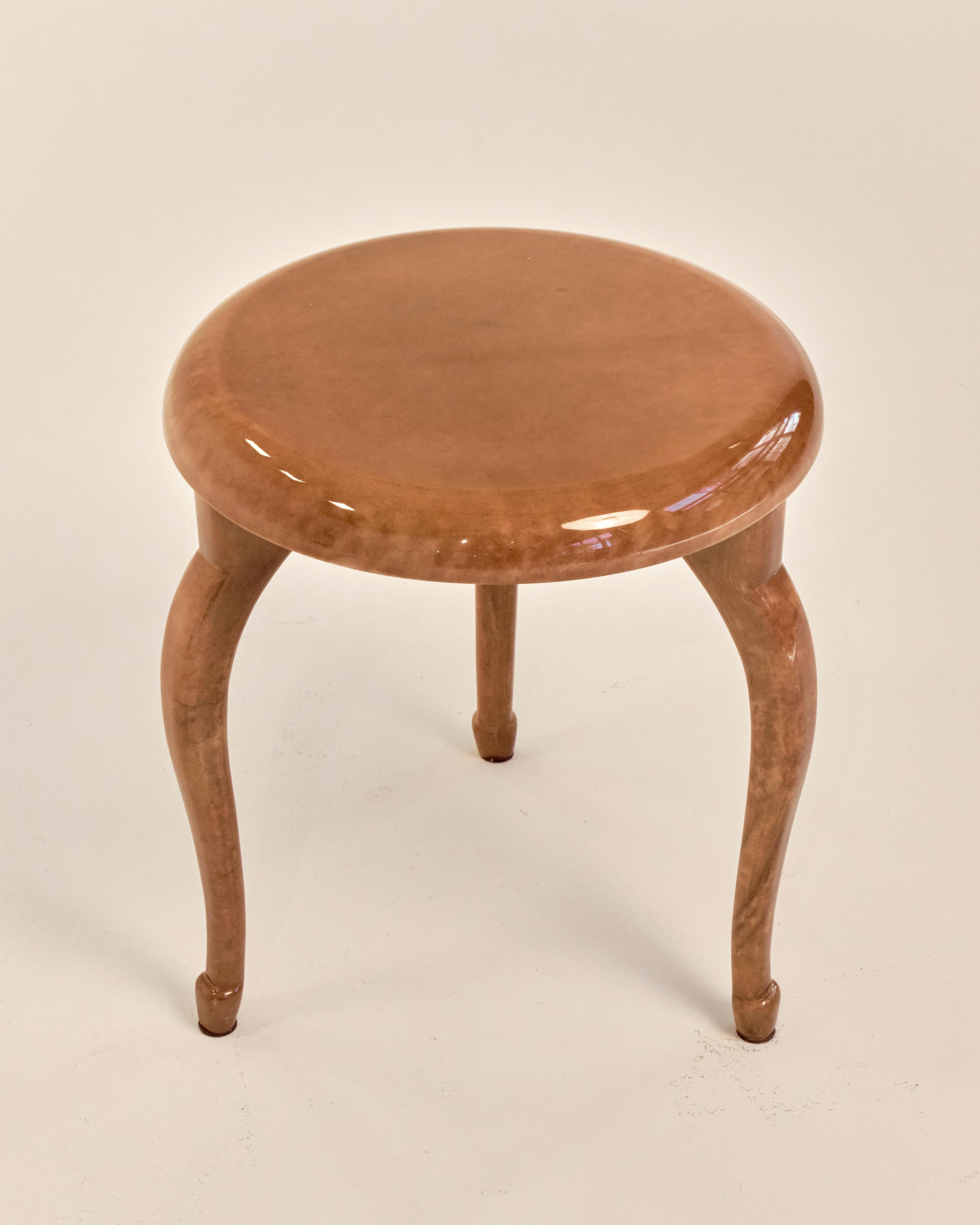 Rare and playful Aldo Tura wood and lacquered goat skin side/end table with curved tapered legs with additional foot detailing element produced in Italy in the 1960's. Table is in great vintage condition with minimal scratches. 

Aldo Tura